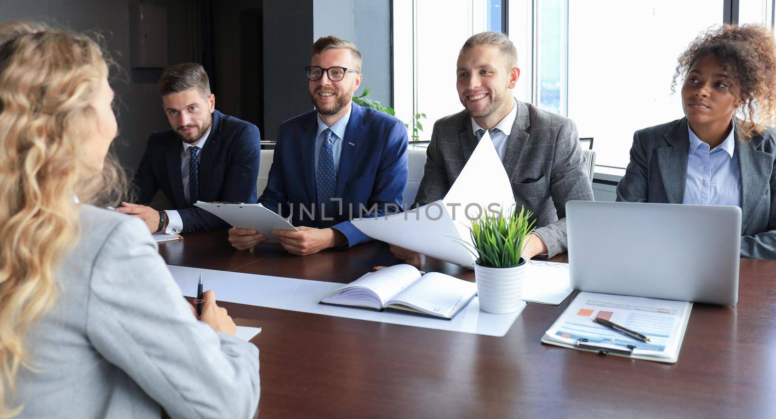 Job interview with the employer, businessman listen to candidate answers