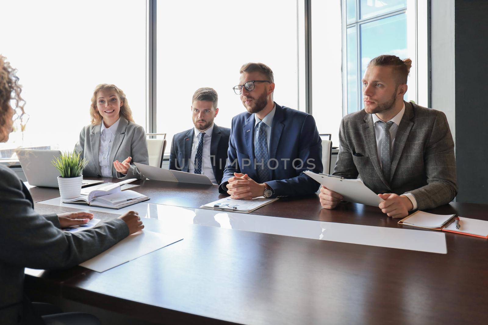 Job interview with the employer, businessman listen to candidate answers