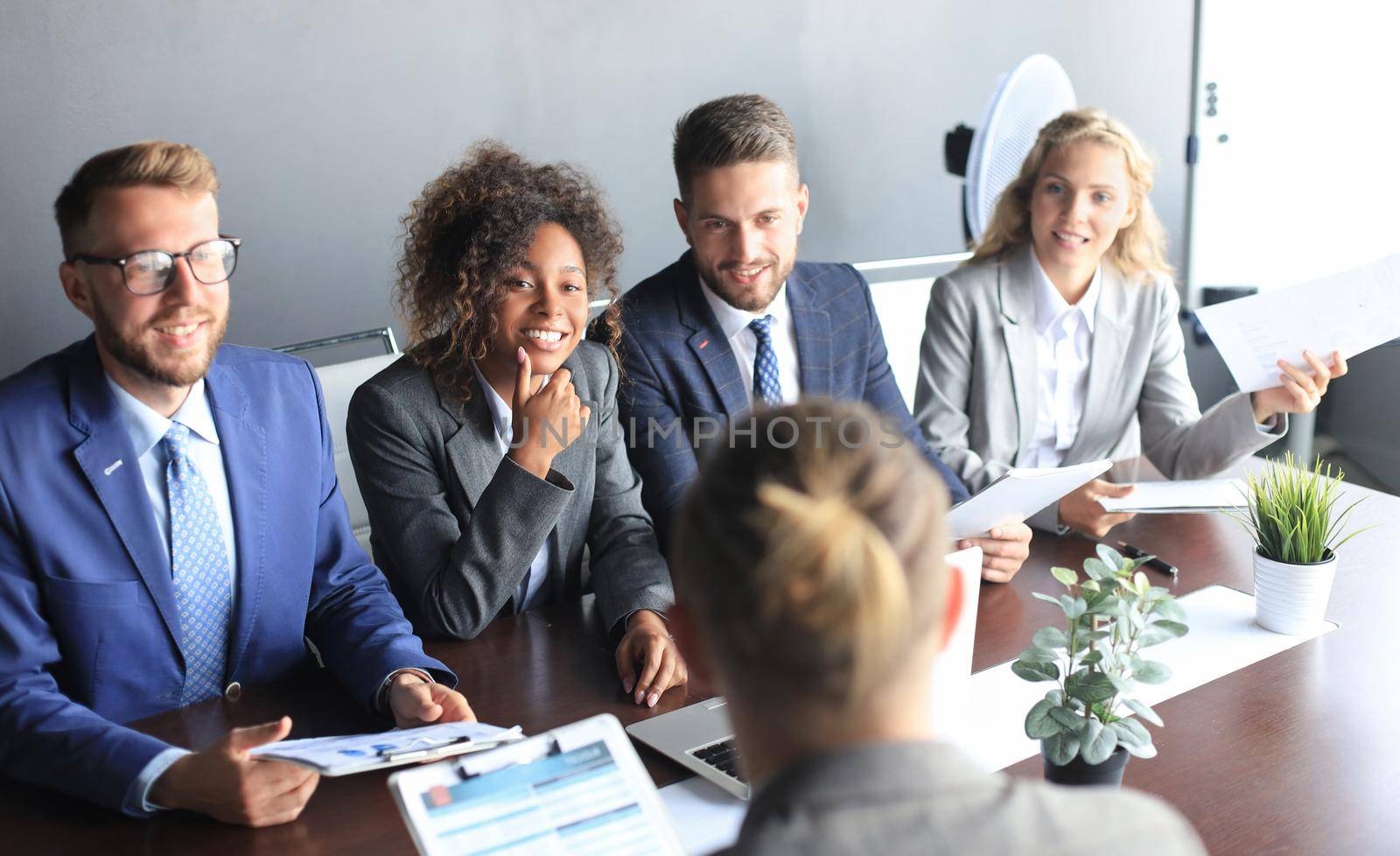 Job interview with the employer, businessman listen to candidate answers