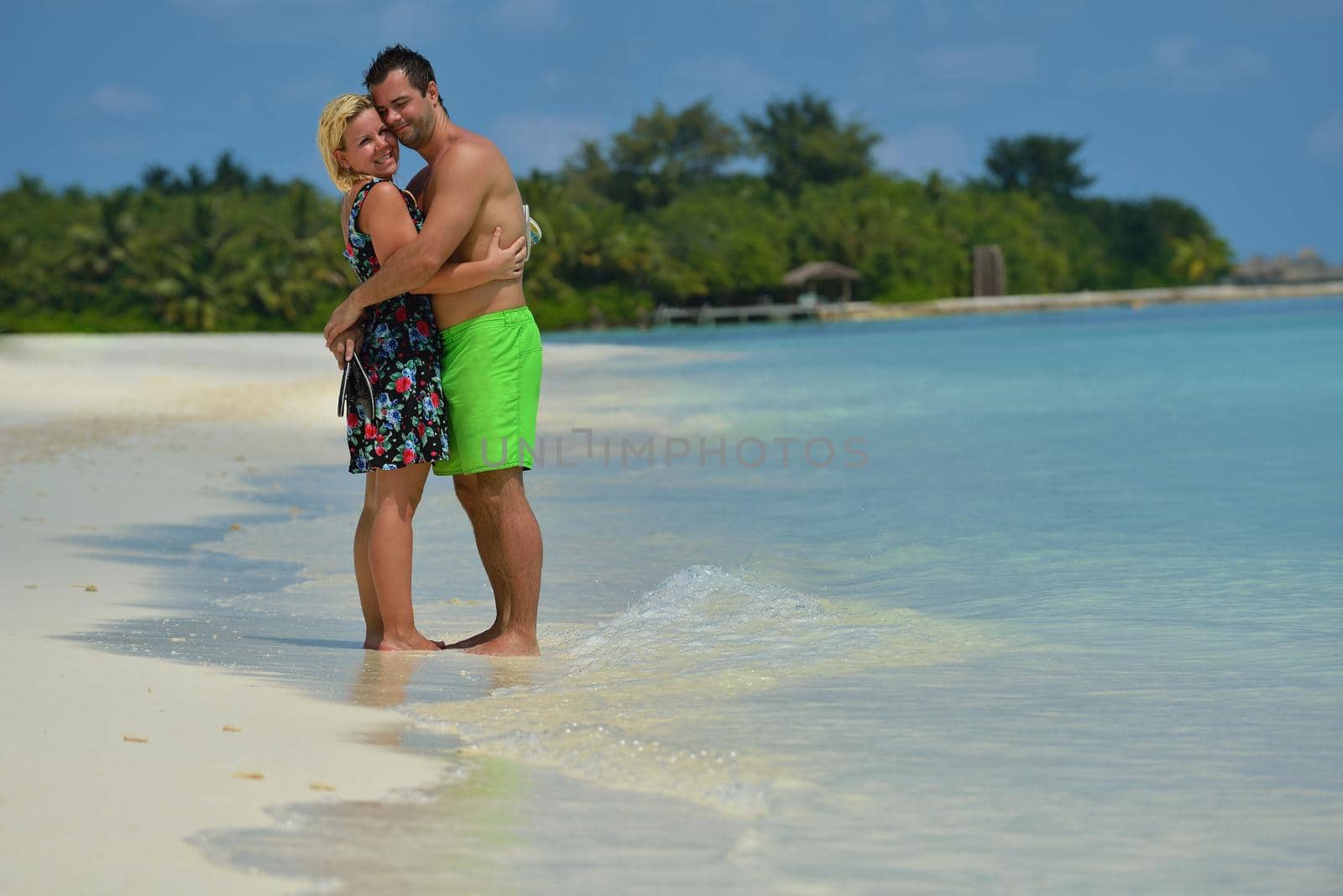 happy young  couple at summer vacation have fun and relax at beautiful sunny  day