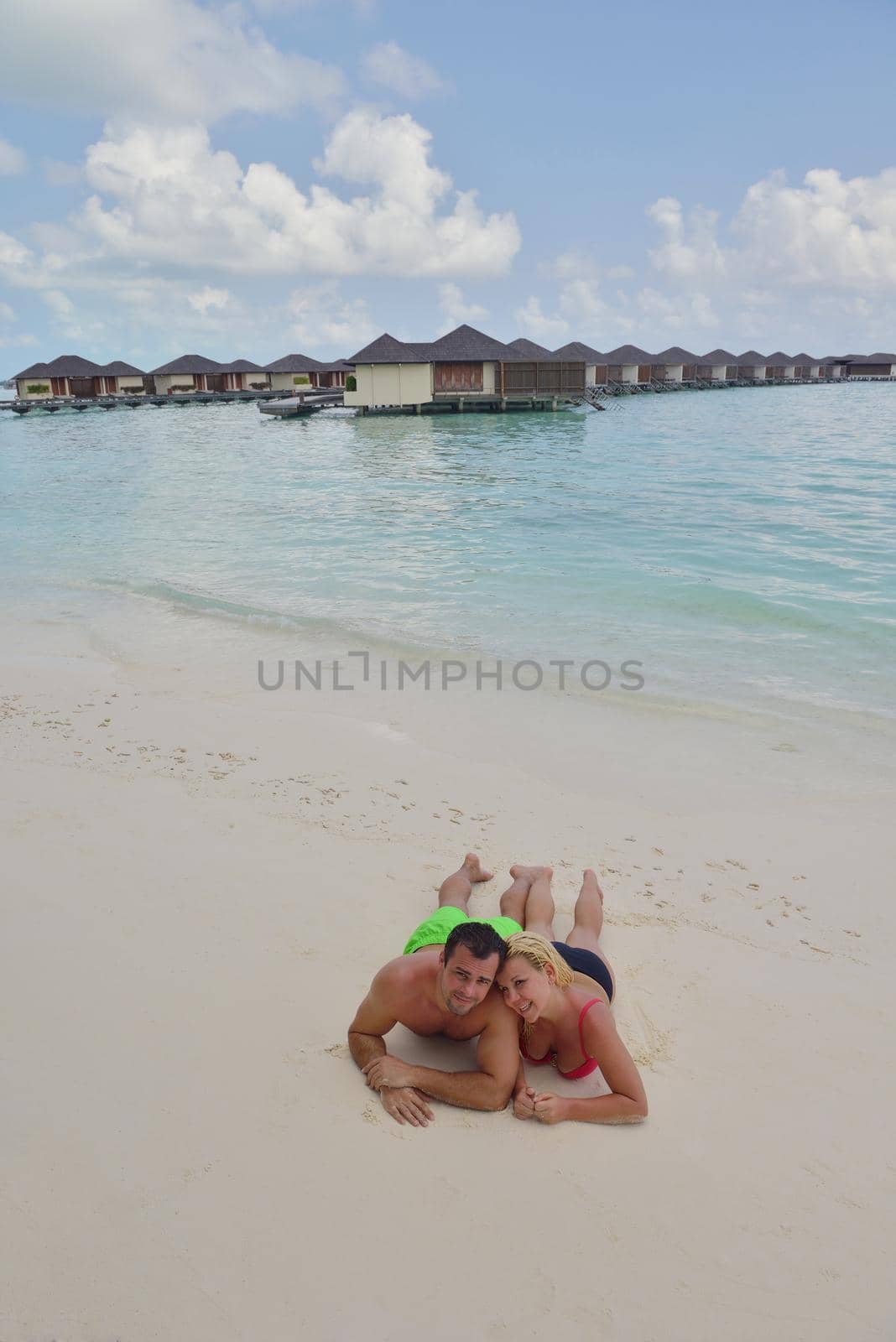 happy young  couple at summer vacation have fun and relax at beautiful sunny  day