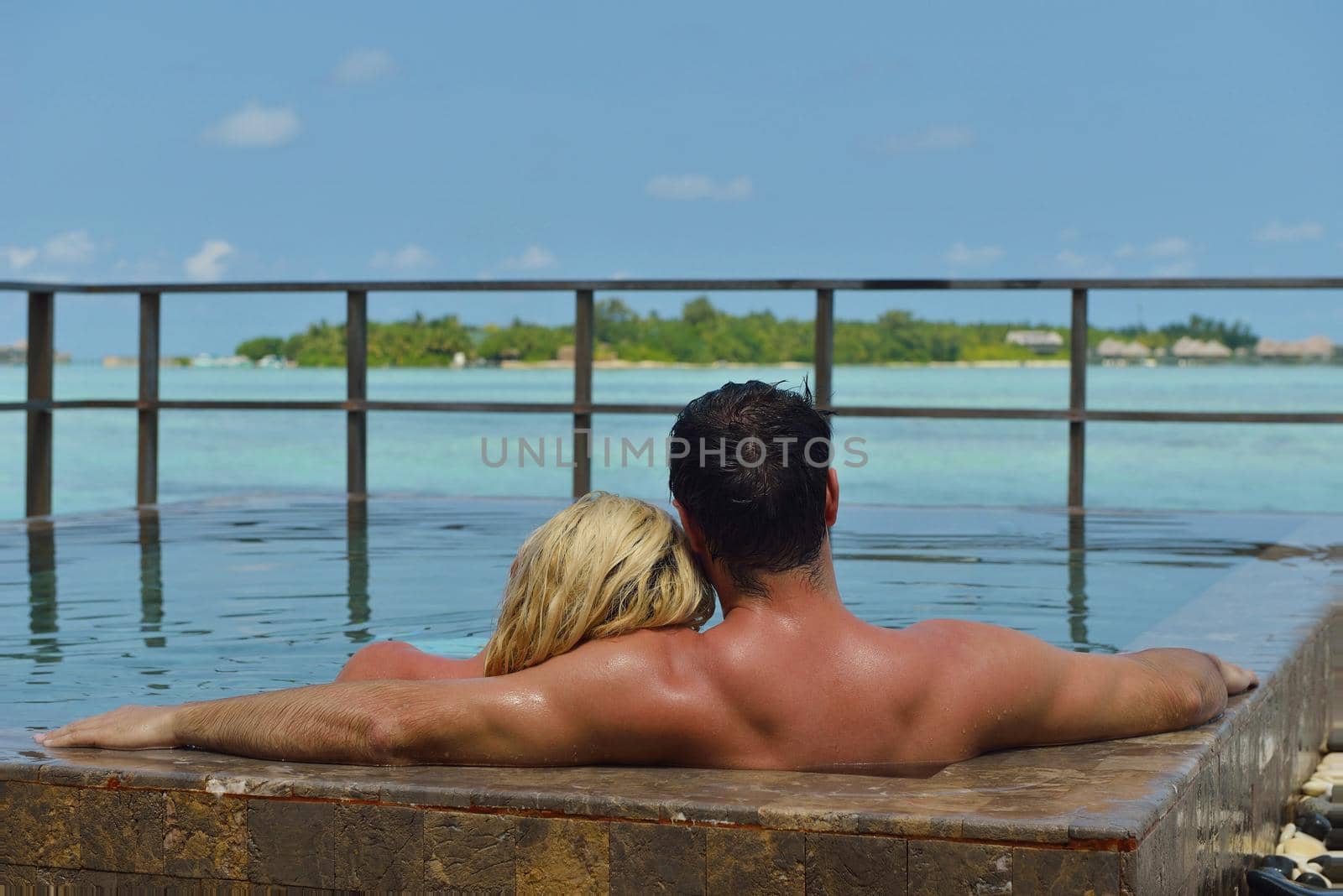 happy young  couple at summer vacation have fun and relax at beautiful sunny  day on beach