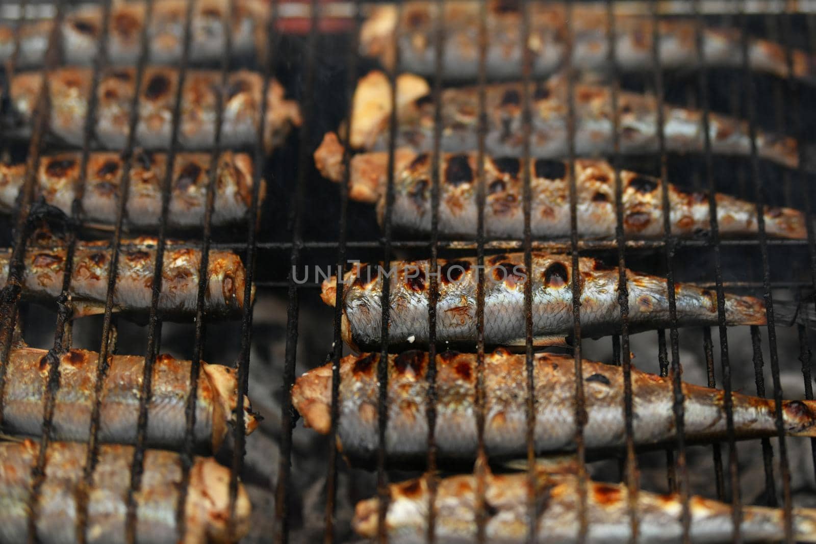 Herring on the grill on a street market