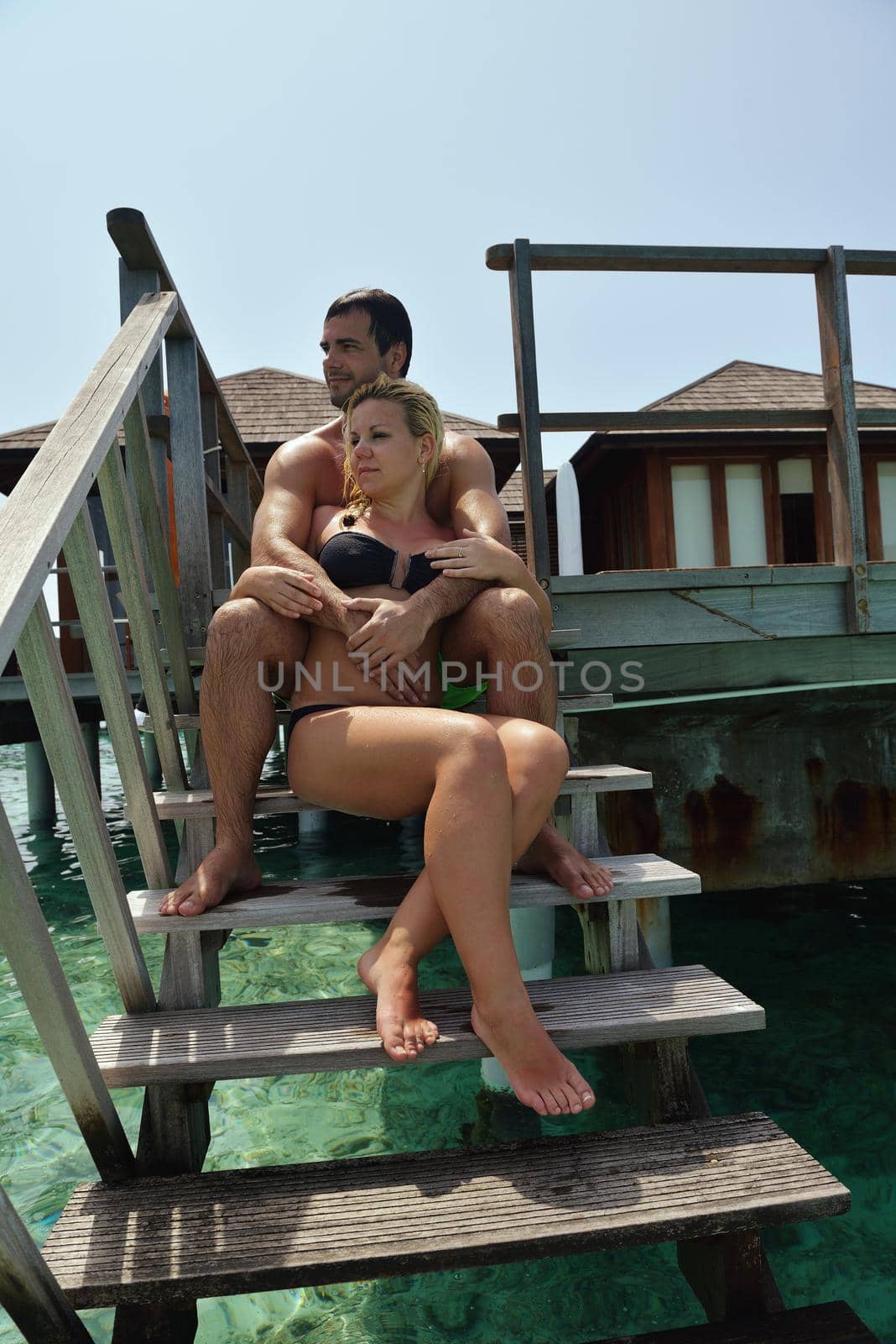 happy young  couple at summer vacation have fun and relax at beautiful sunny  day on beach