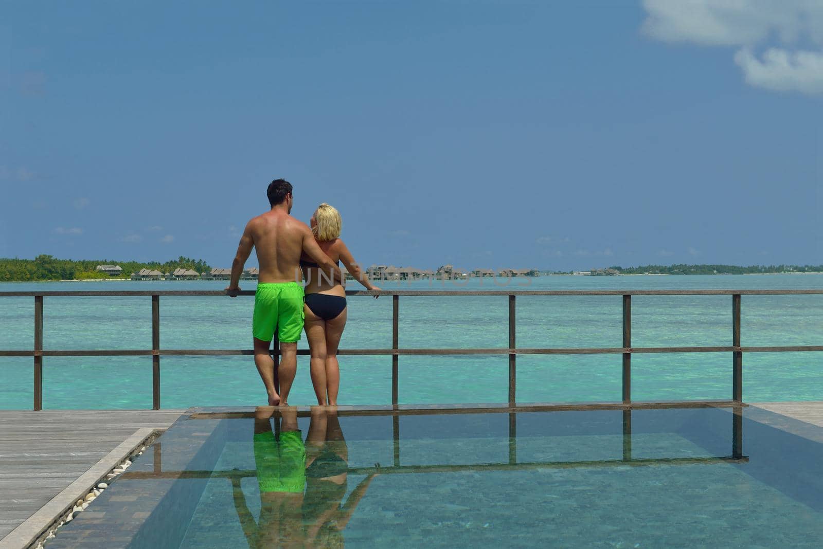 happy young  couple at summer vacation have fun and relax at beautiful sunny  day on beach