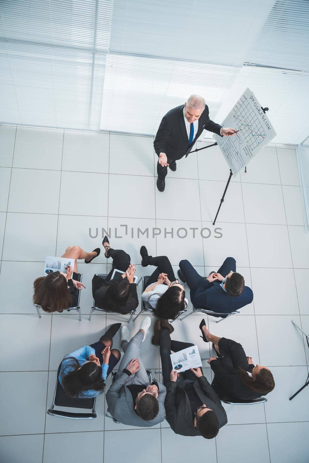 top view. group of business people at a presentation in the conference room