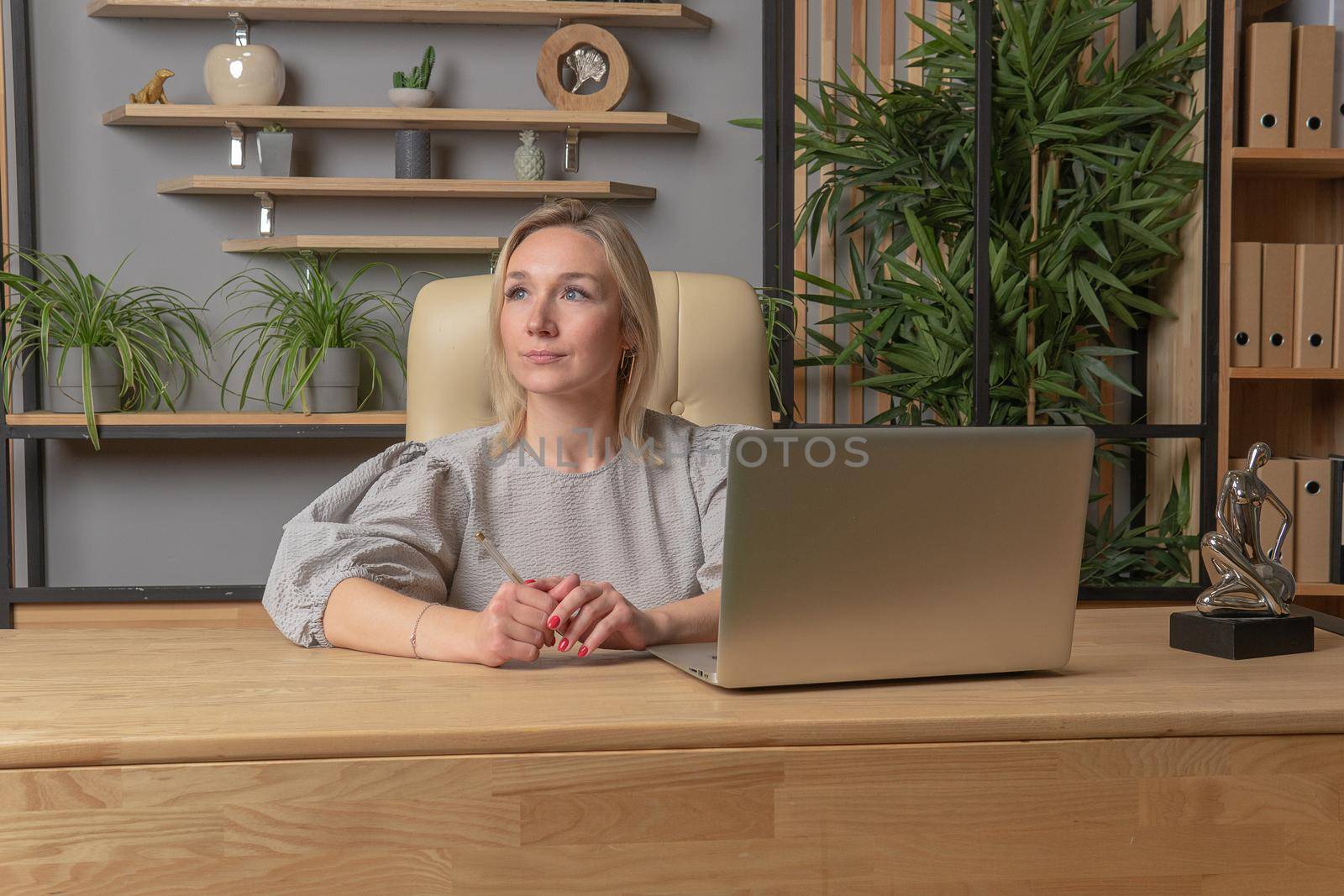 Woman sits on a chair girl office, technology beautiful people attractive studio, relaxation. Pose cute, furniture joyful by 89167702191