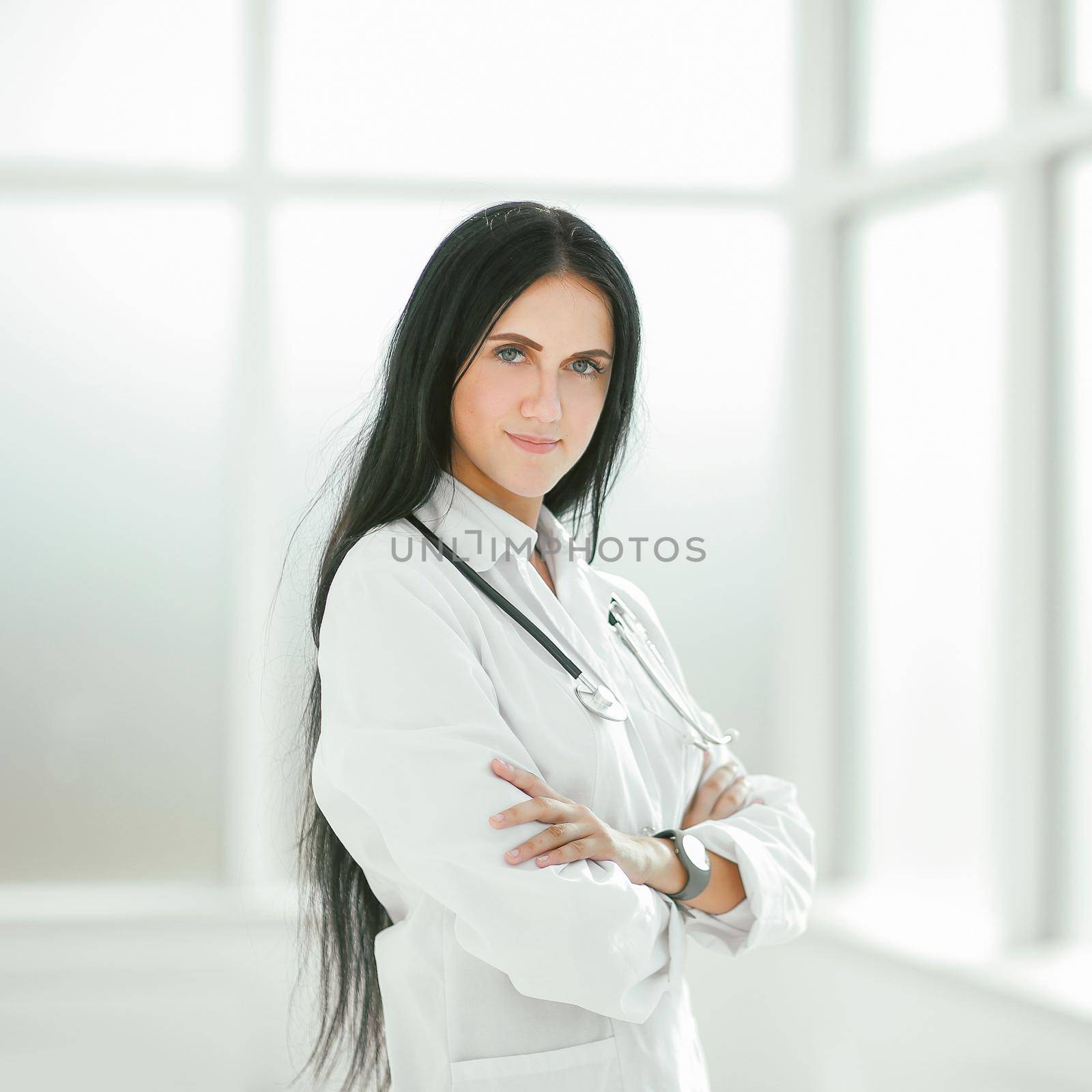 female therapist standing by the hospital window.photo with copy space