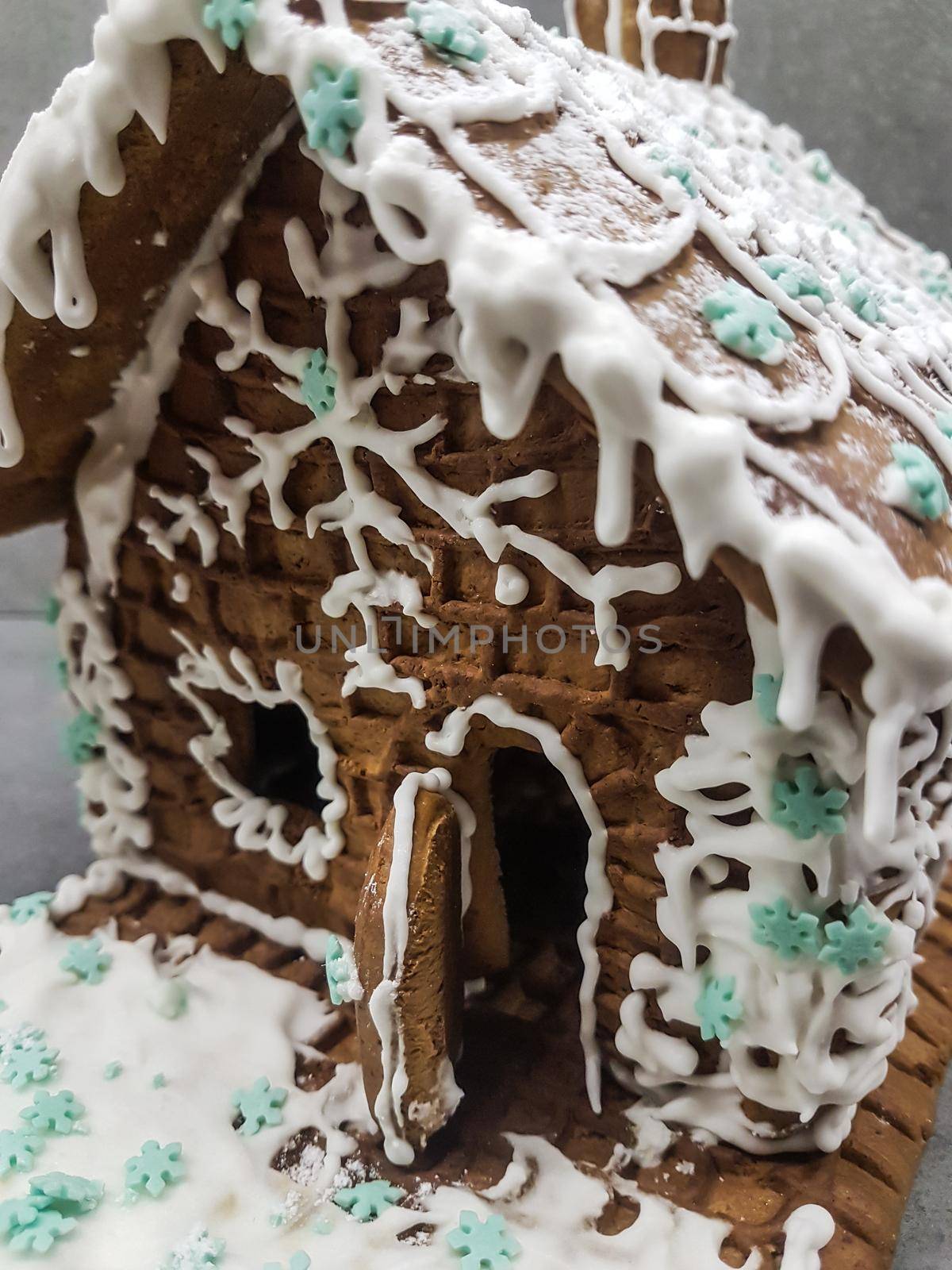 close up. beautiful gingerbread house on a light background. holidays and traditions
