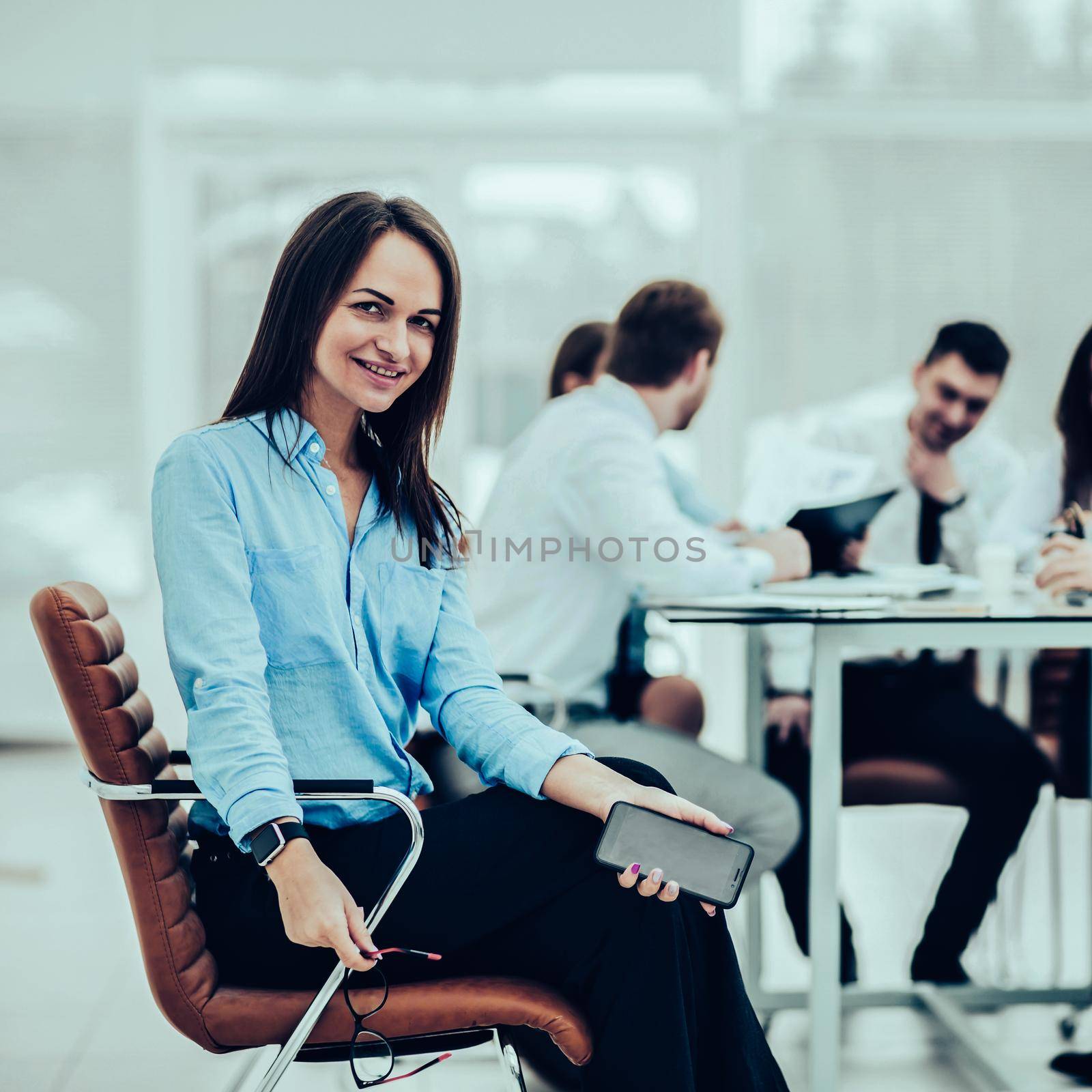 leading lawyer of the company on background, business meeting business partners. the photo has a empty space for your text.