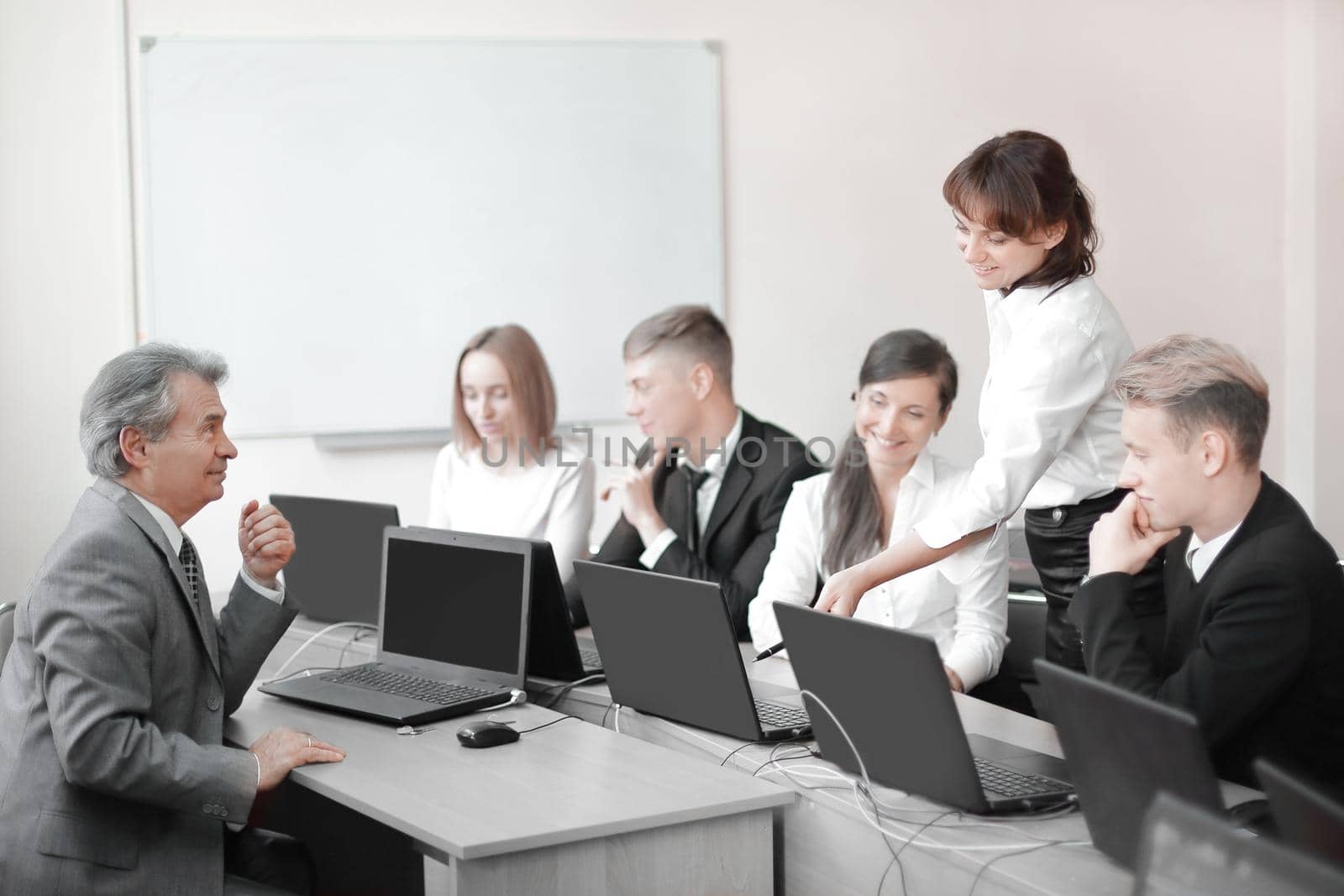 business team working on laptops in a modern office.people and technology