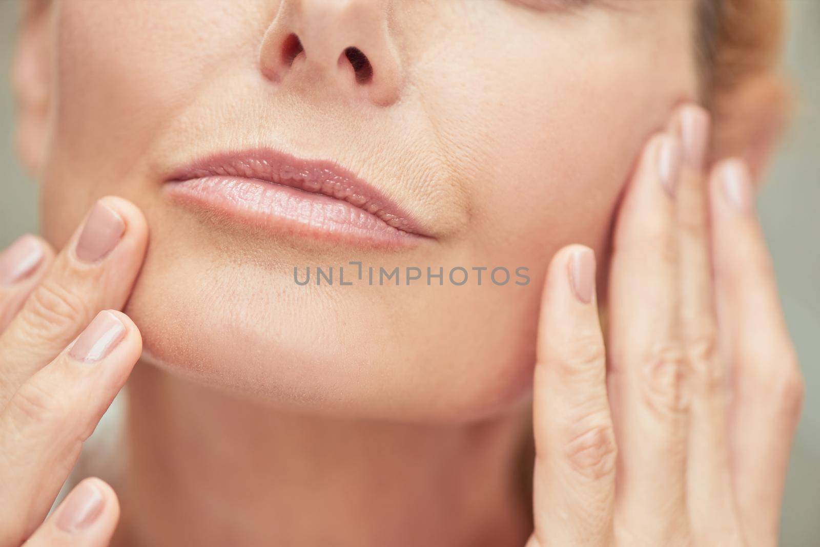 Lips of middle aged caucasian woman by friendsstock