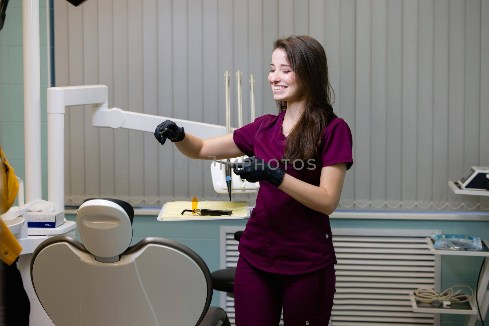 beautiful woman doctor with dental equipment in dentistry. High quality photo