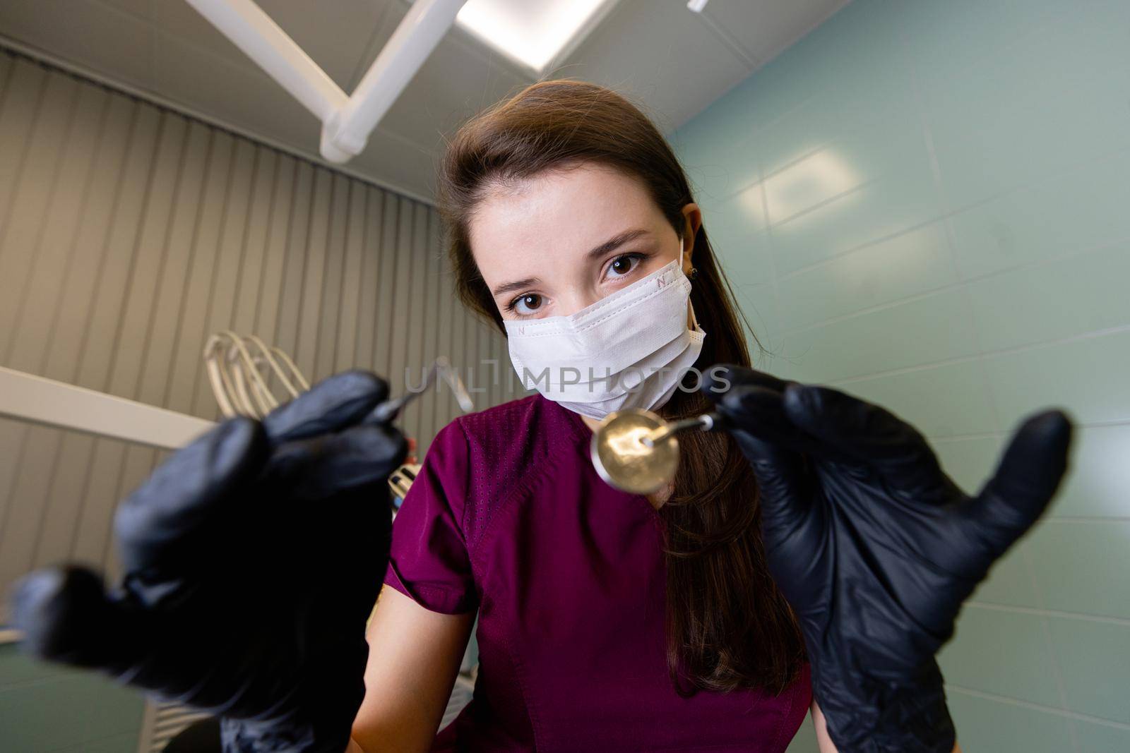 beautiful woman doctor with dental equipment in dentistry. High quality photo