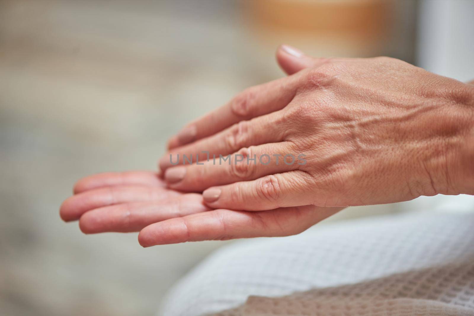 Beautiful manicured middle aged woman hands by friendsstock