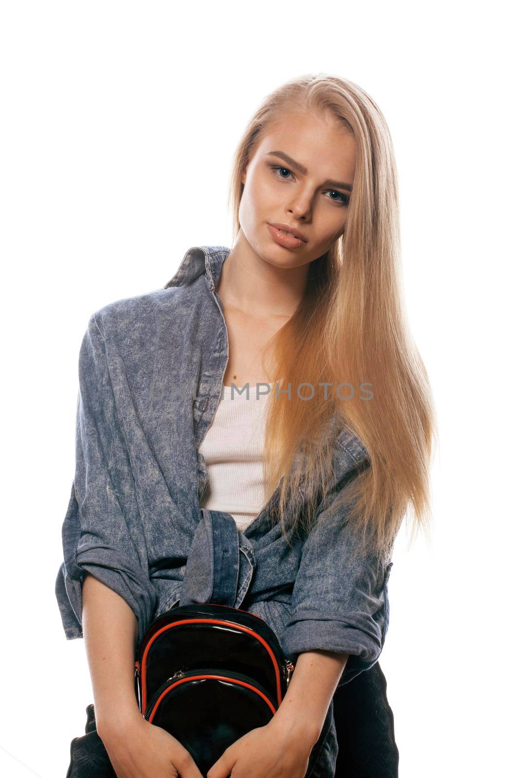 young blond real woman on white backgroung gesture thumbs up, isolated emotional posing close up