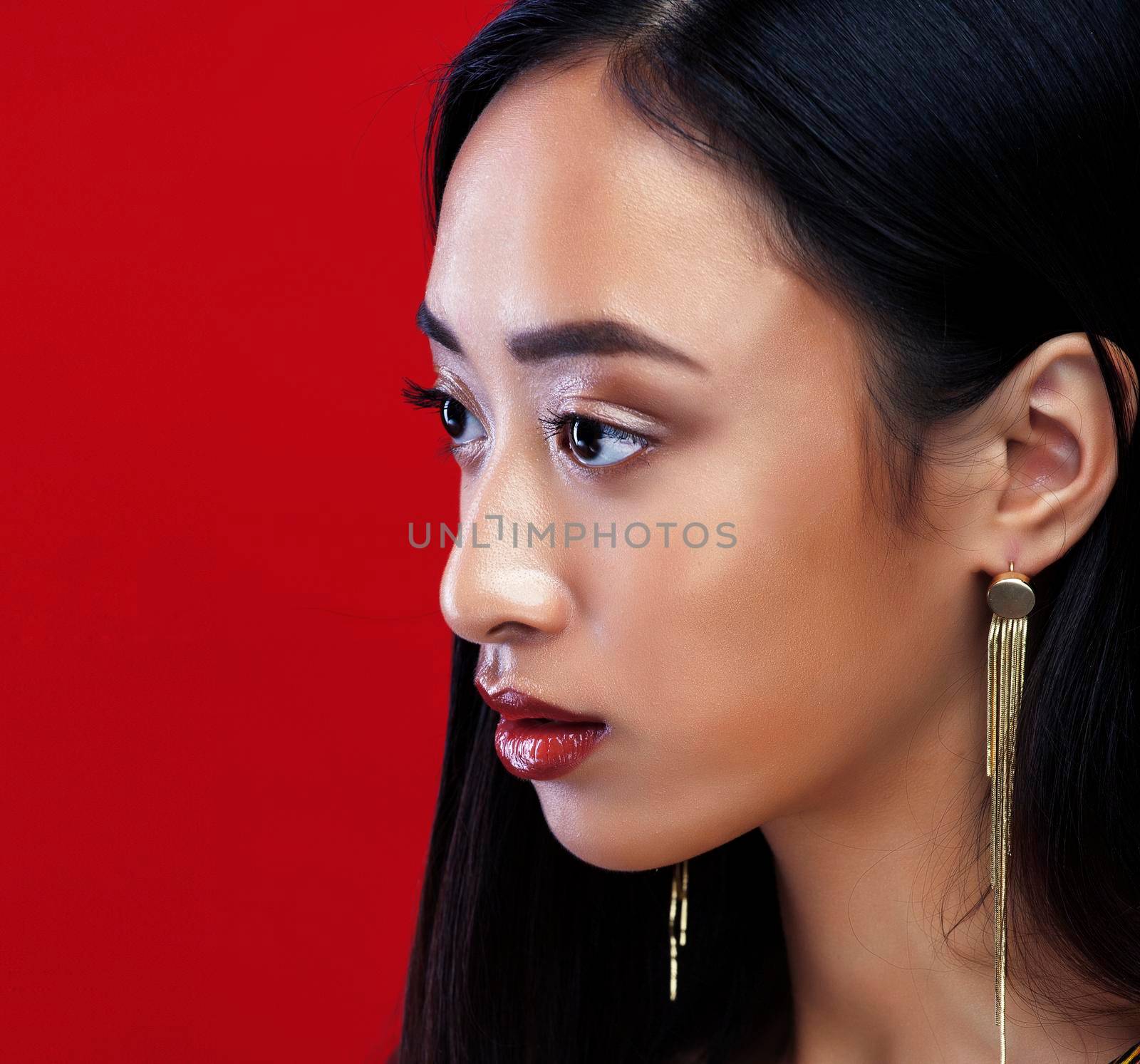 beauty young asian girl with fashion make up on red background , beauty stylish look by JordanJ