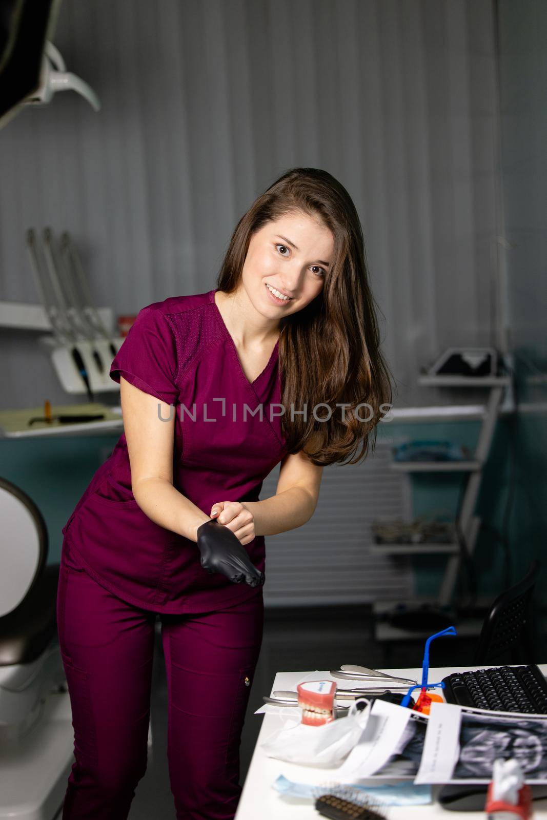 beautiful woman doctor with dental equipment in dentistry. High quality photo