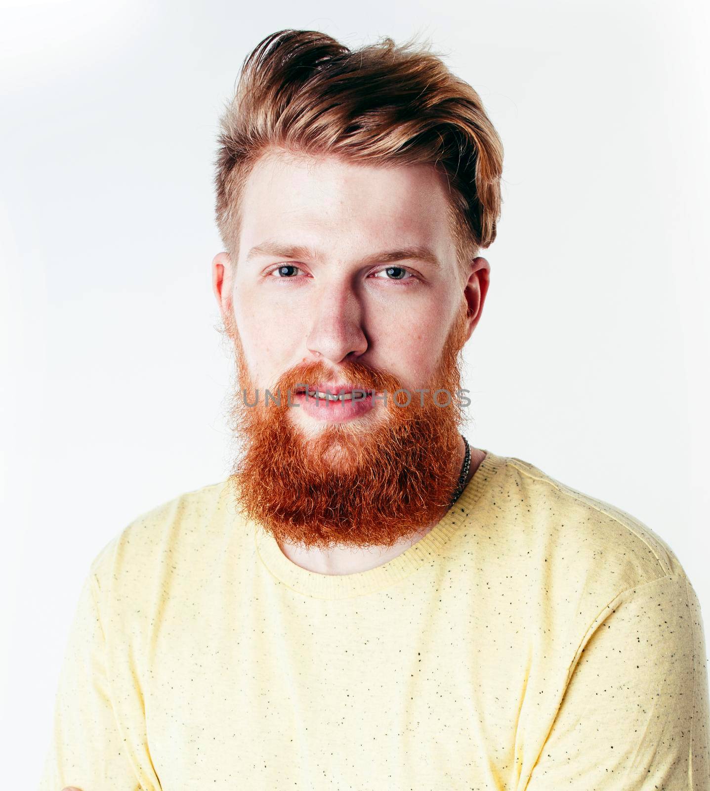 young handsome hipster ginger bearded guy looking brutal isolated on white background, lifestyle people concept by JordanJ