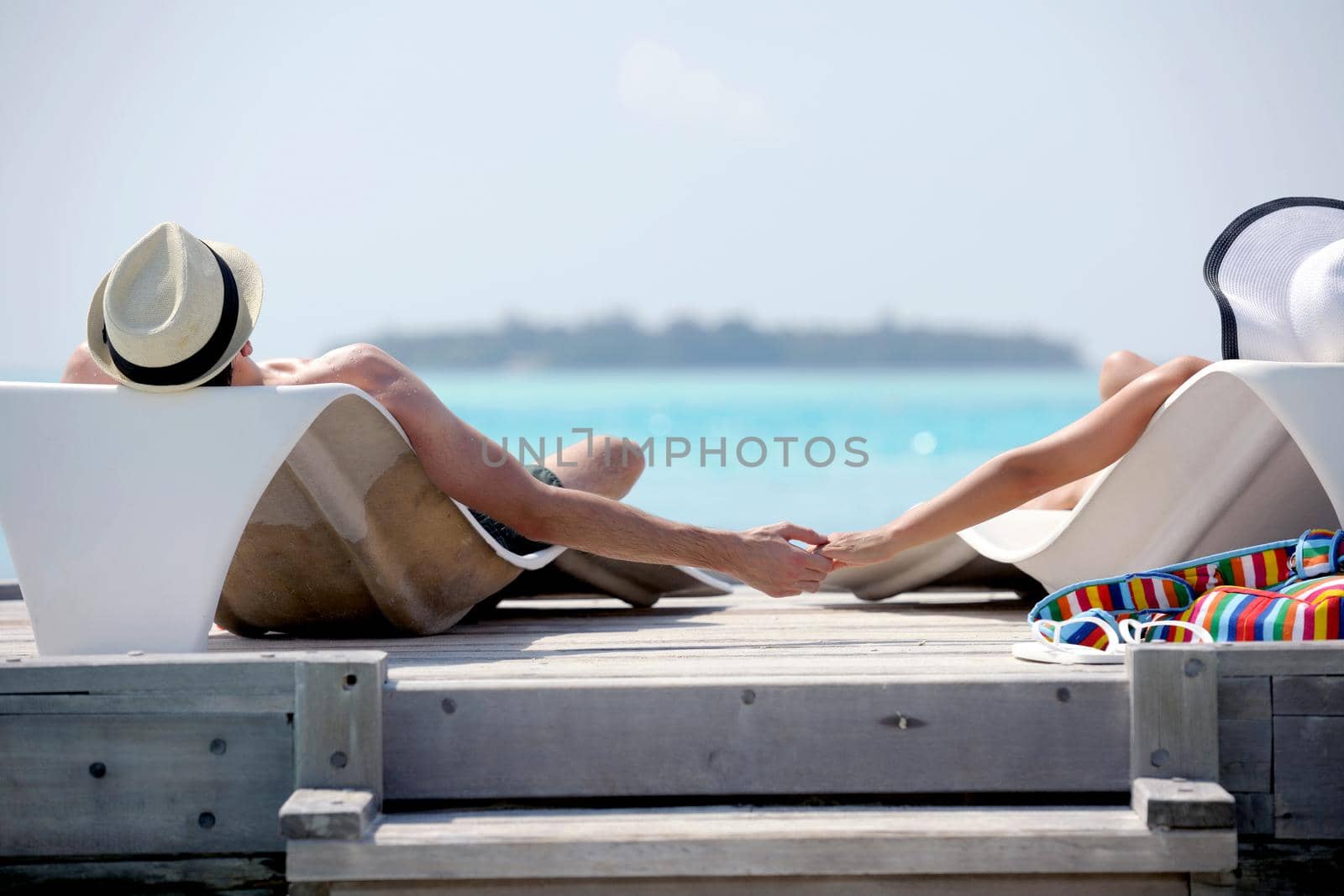 happy young romantic couple in love have fun running and relaxing on beautiful beach