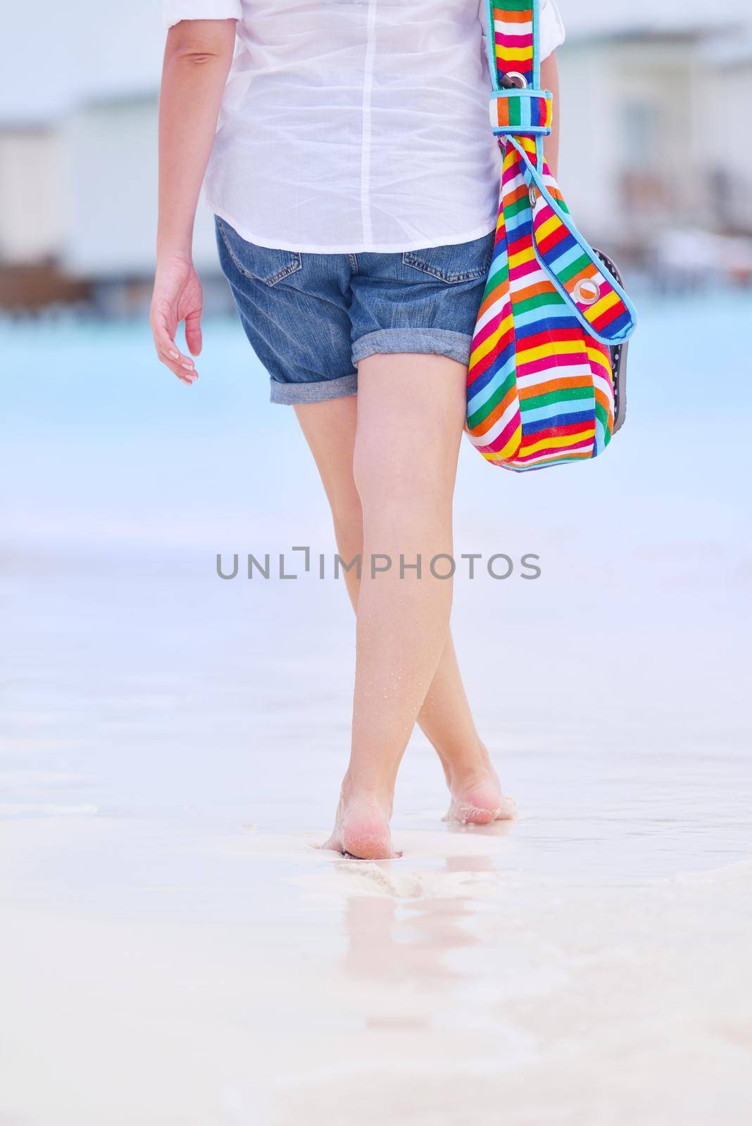 beautiful and happy woman girl on beach have fun and relax on summer vacation  over the sea