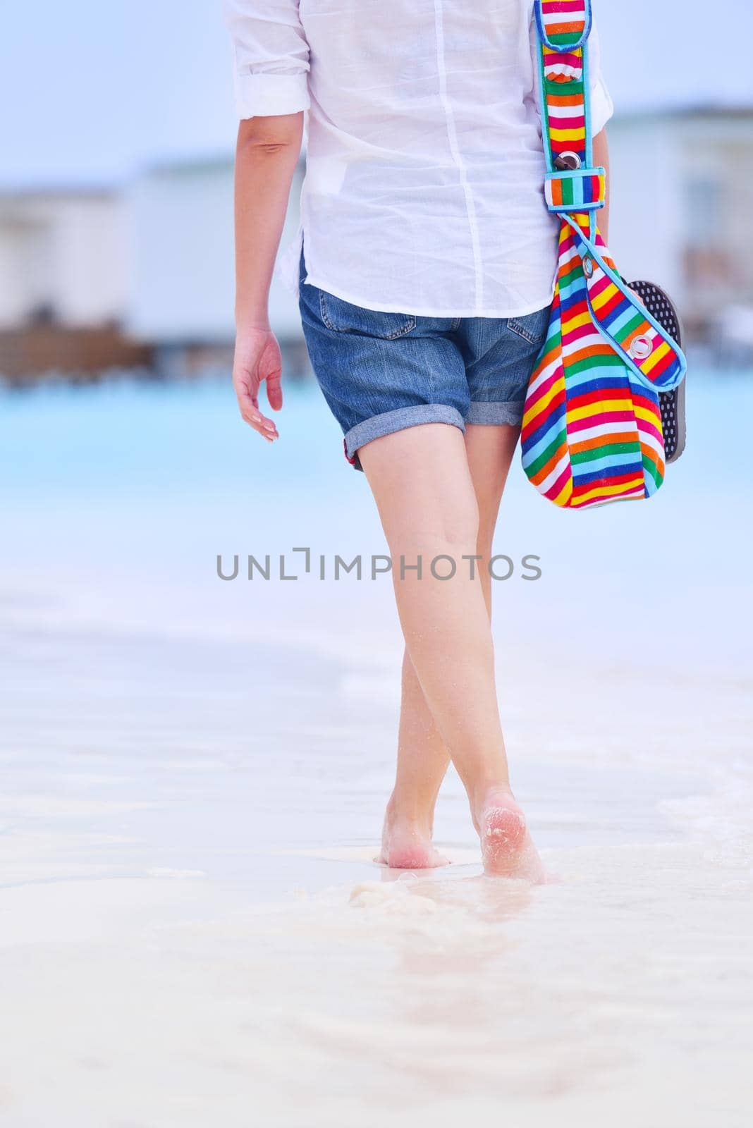 beautiful and happy woman girl on beach have fun and relax on summer vacation  over the sea