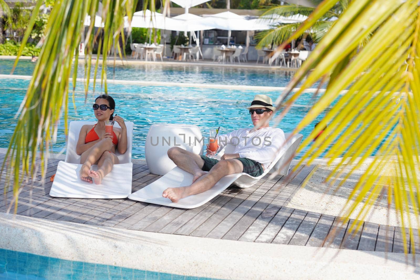 happy young romantic couple in love have fun running and relaxing on beautiful beach