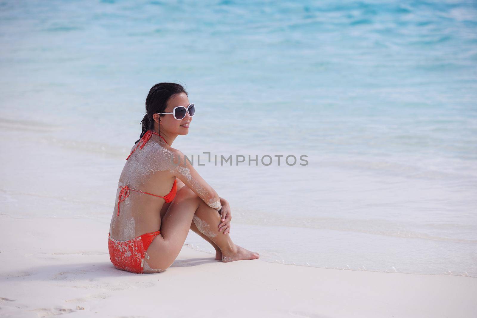 beautifel and happy woman girl on beach have fun and relax on summer vacation  over the sea