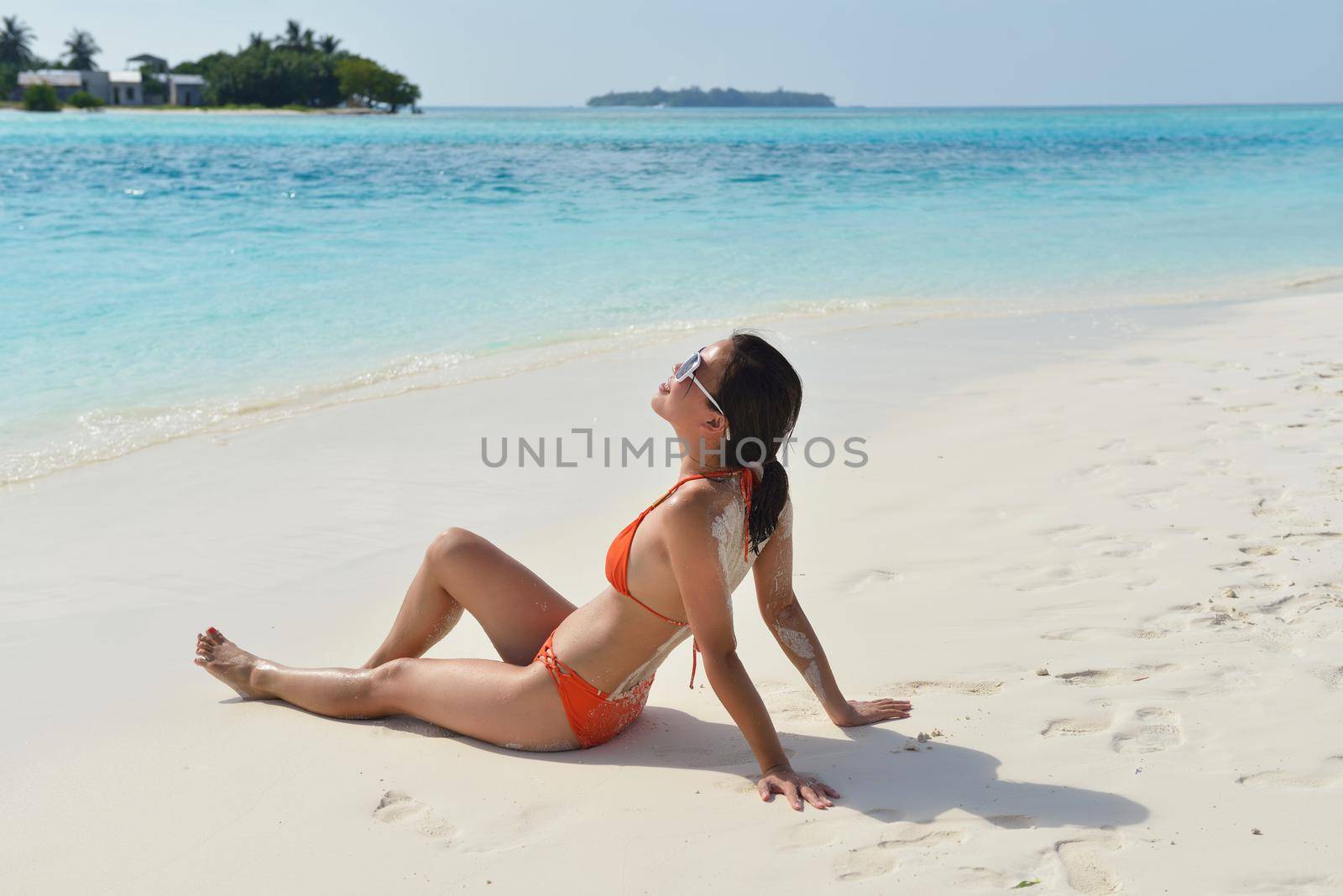 beautifel and happy woman girl on beach have fun and relax on summer vacation  over the sea