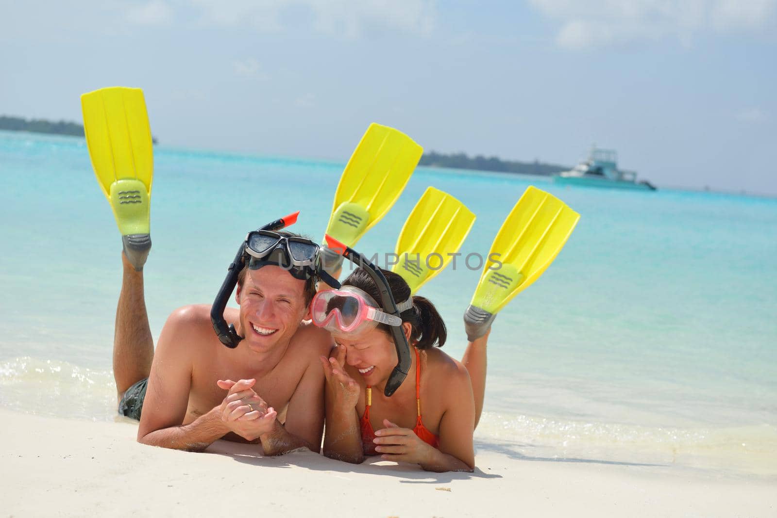 happy young romantic couple in love have fun running and relaxing on beautiful beach