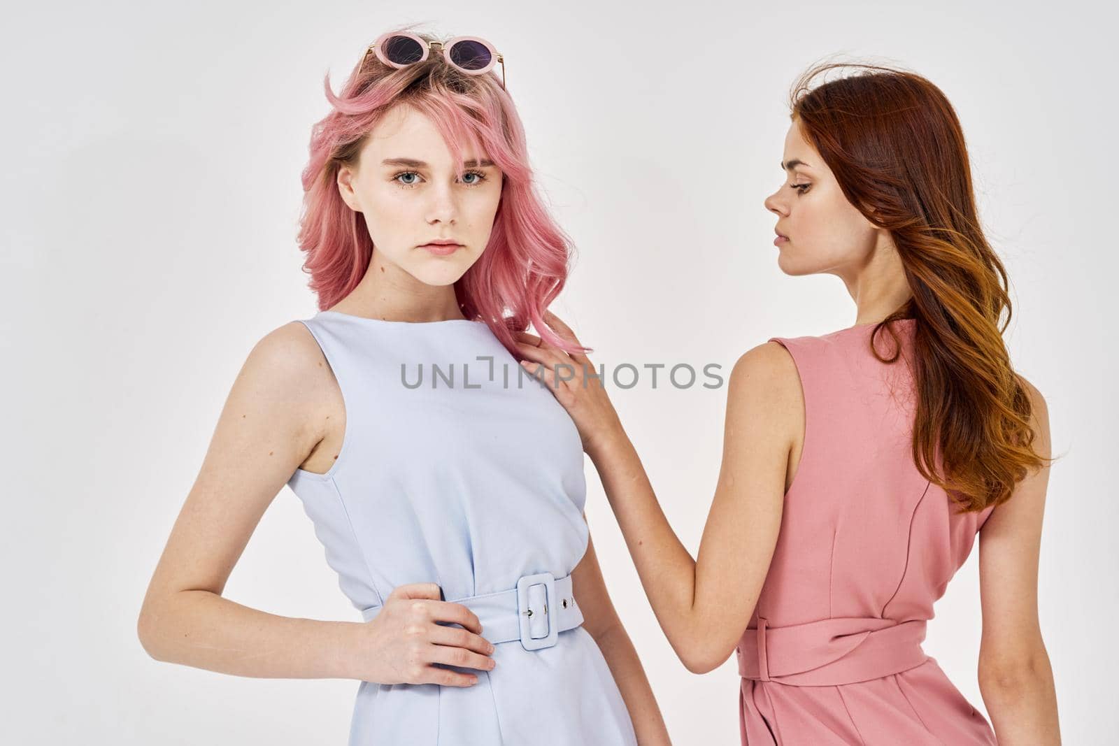 two fashionable girlfriends posing stylish clothes luxury models by Vichizh