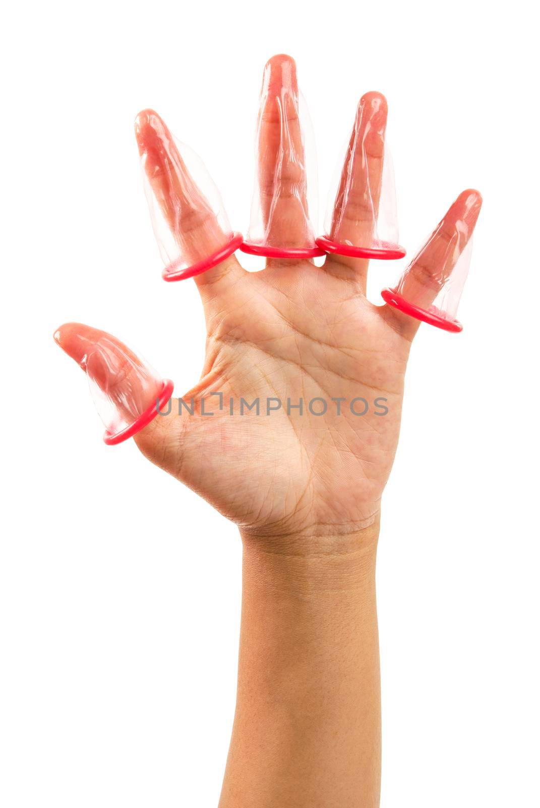 Five fingers of hand under pink condom isolated on a white background. by Gamjai