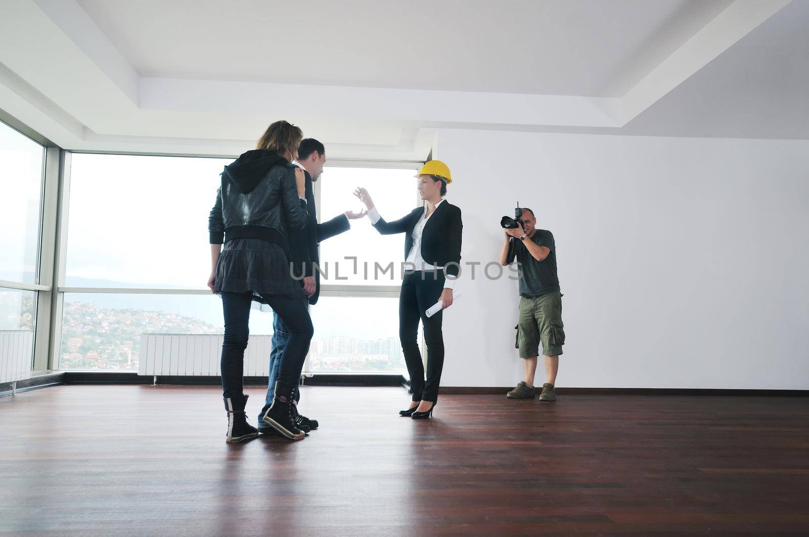 profesional stock photographer on stock photo session with young models 