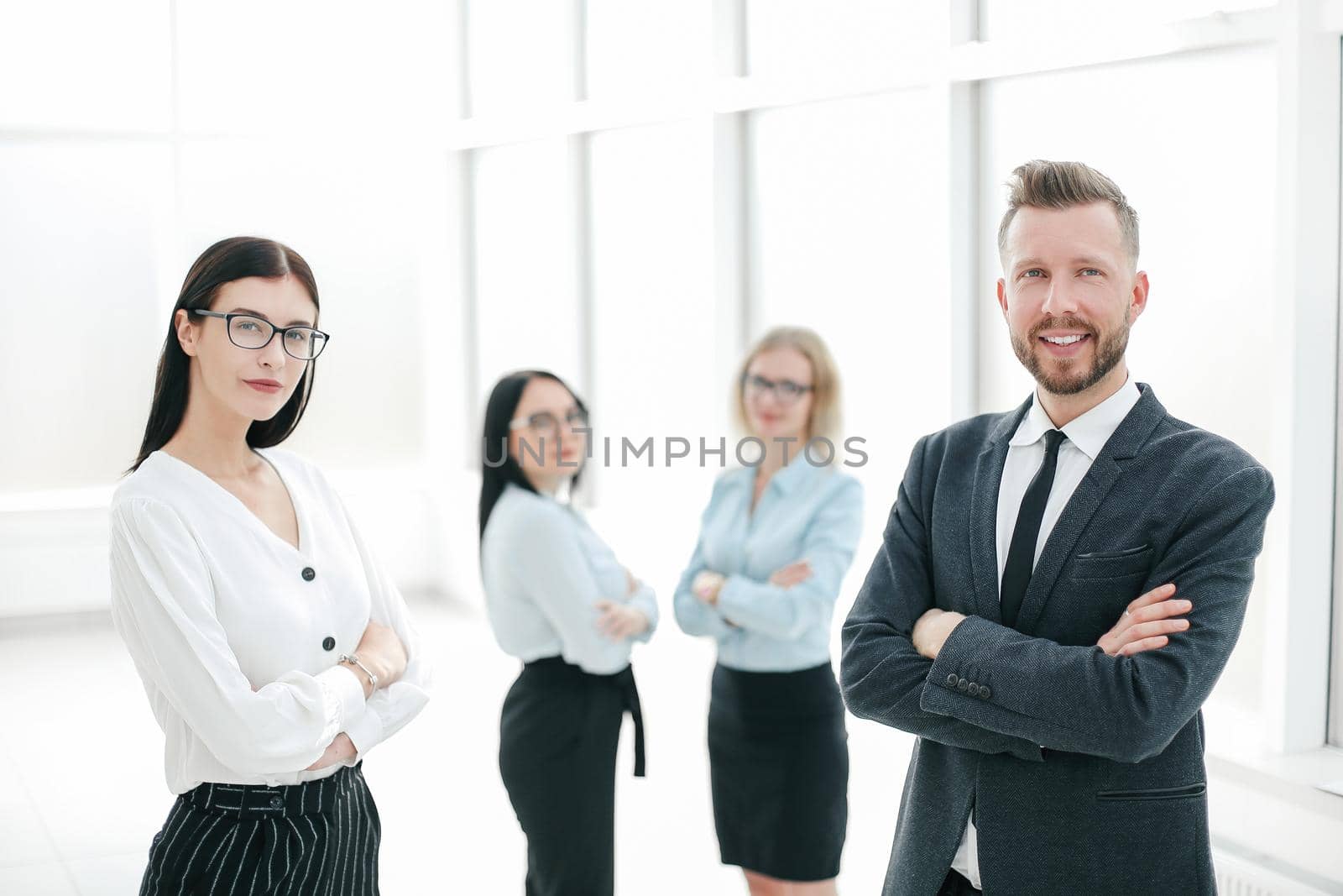 group of successful employees standing in the office .photo with copy space