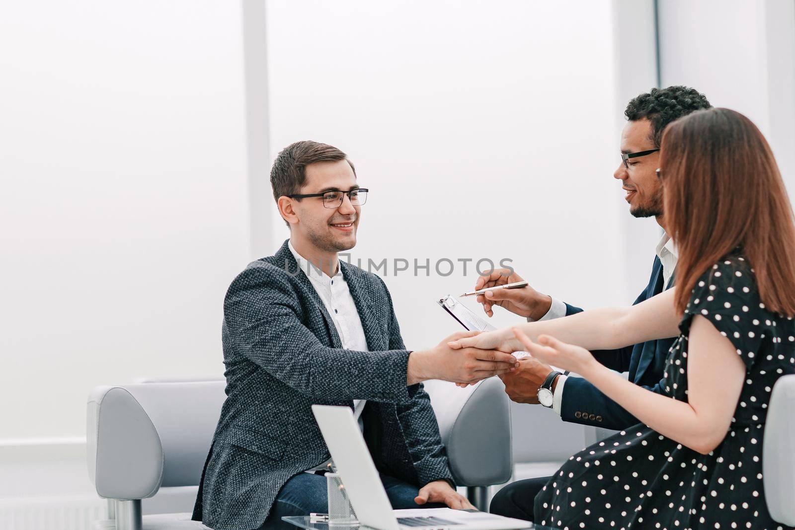 business people shaking hands after a business meeting . concept of cooperation