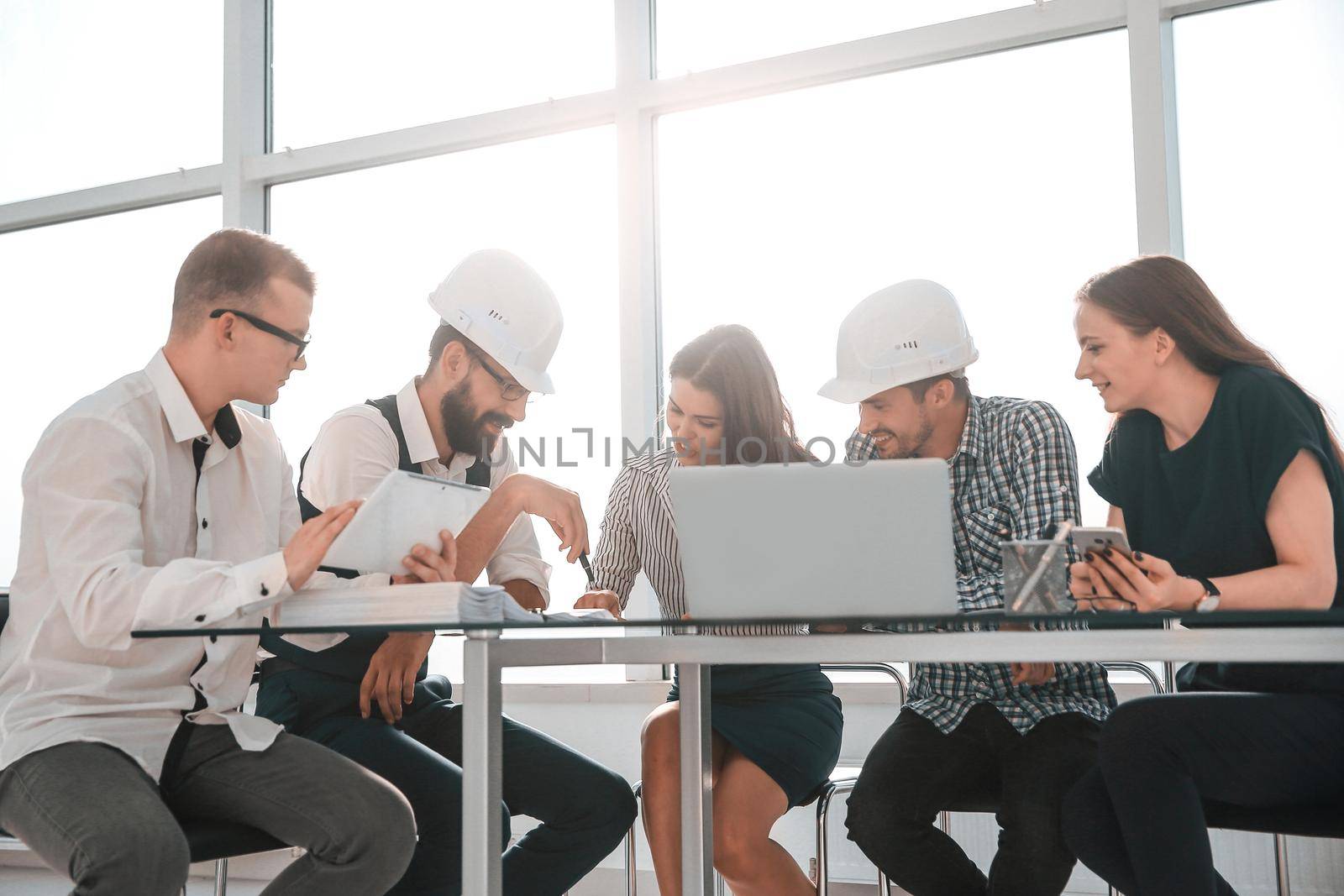 architects discussing with the customer a new project. the concept of professionalism
