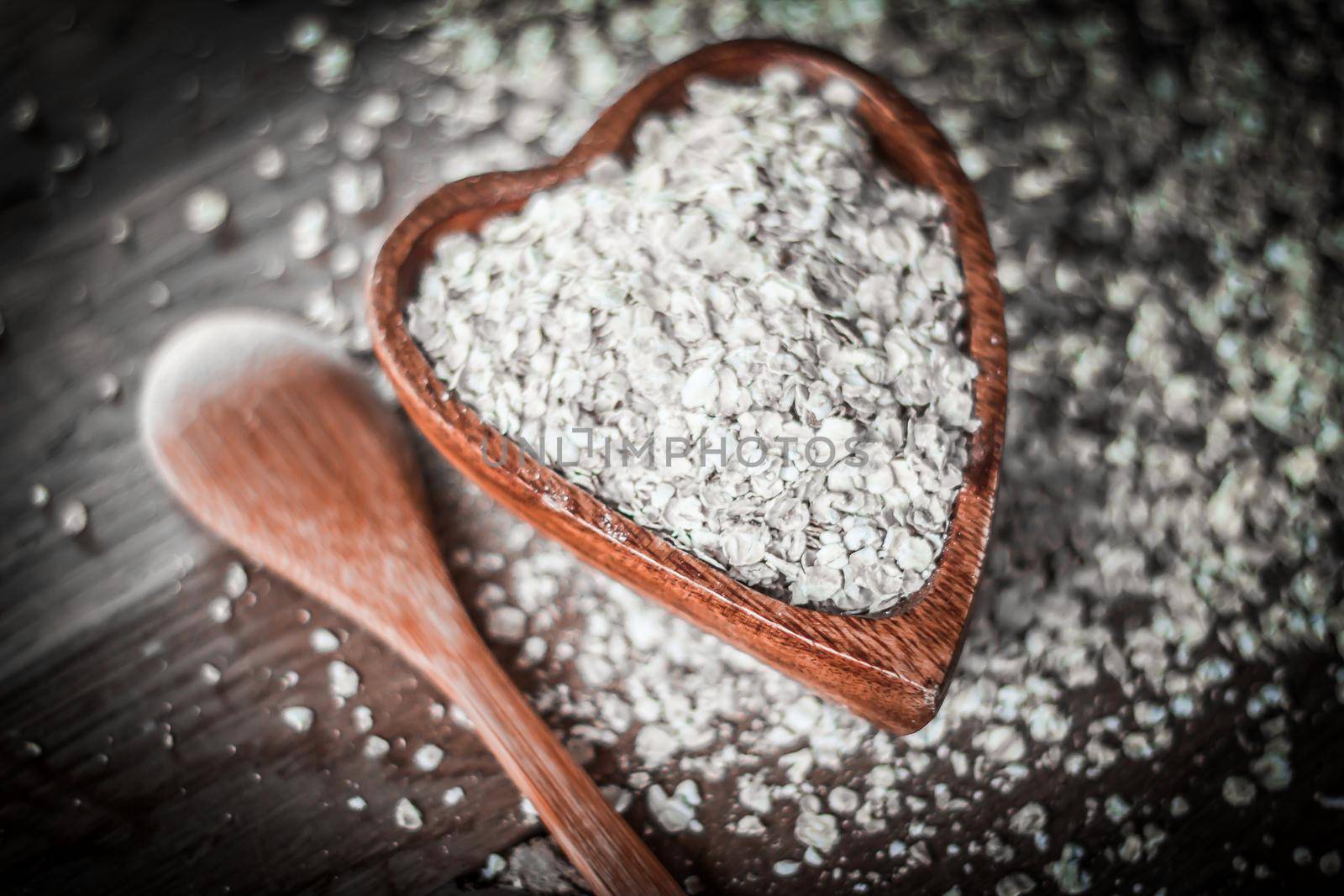 closeup.muesli with bran on a wooden table.healthy food concept