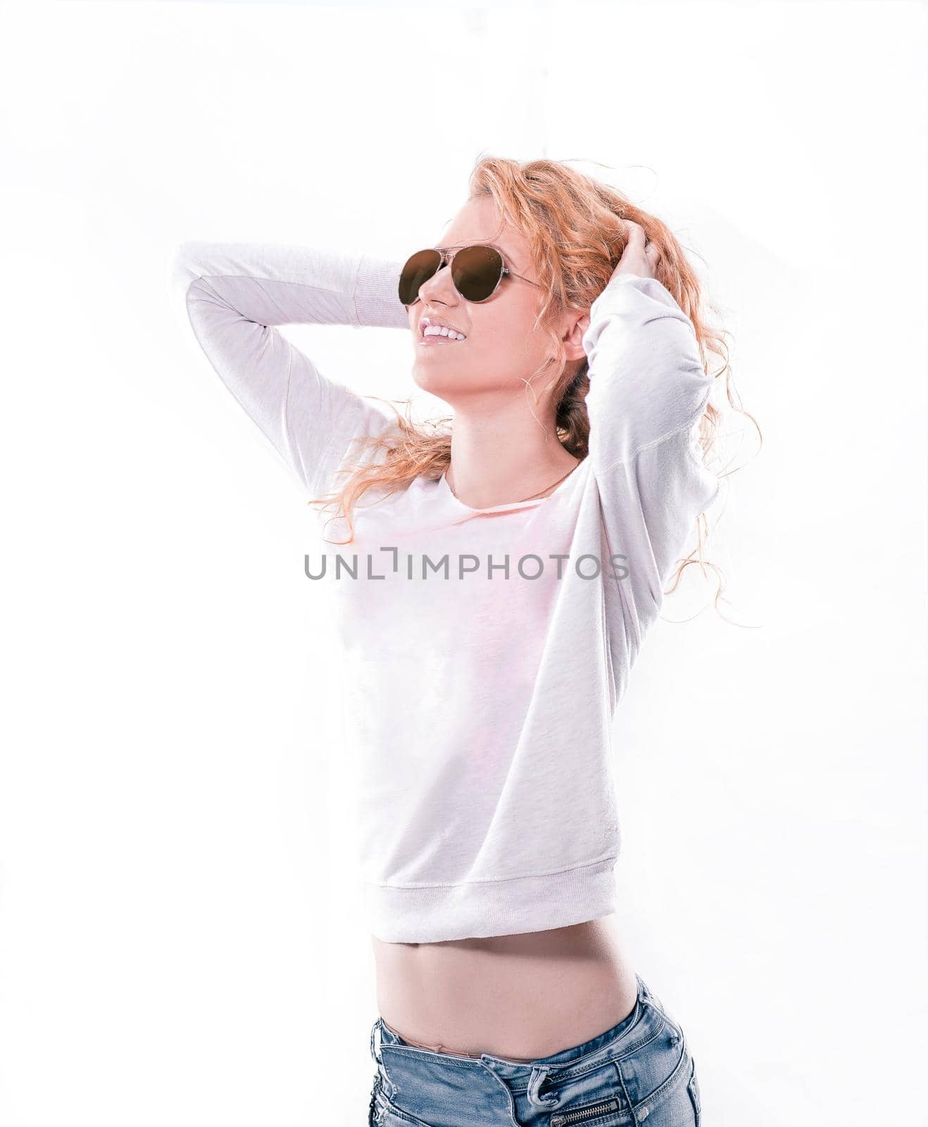 portrait of a dreaming pretty girl in sunglasses. isolated on white