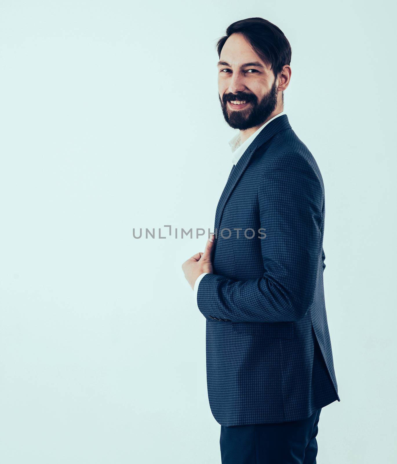 side view - a confident businessman in a business suit.the photo has a empty space for your text