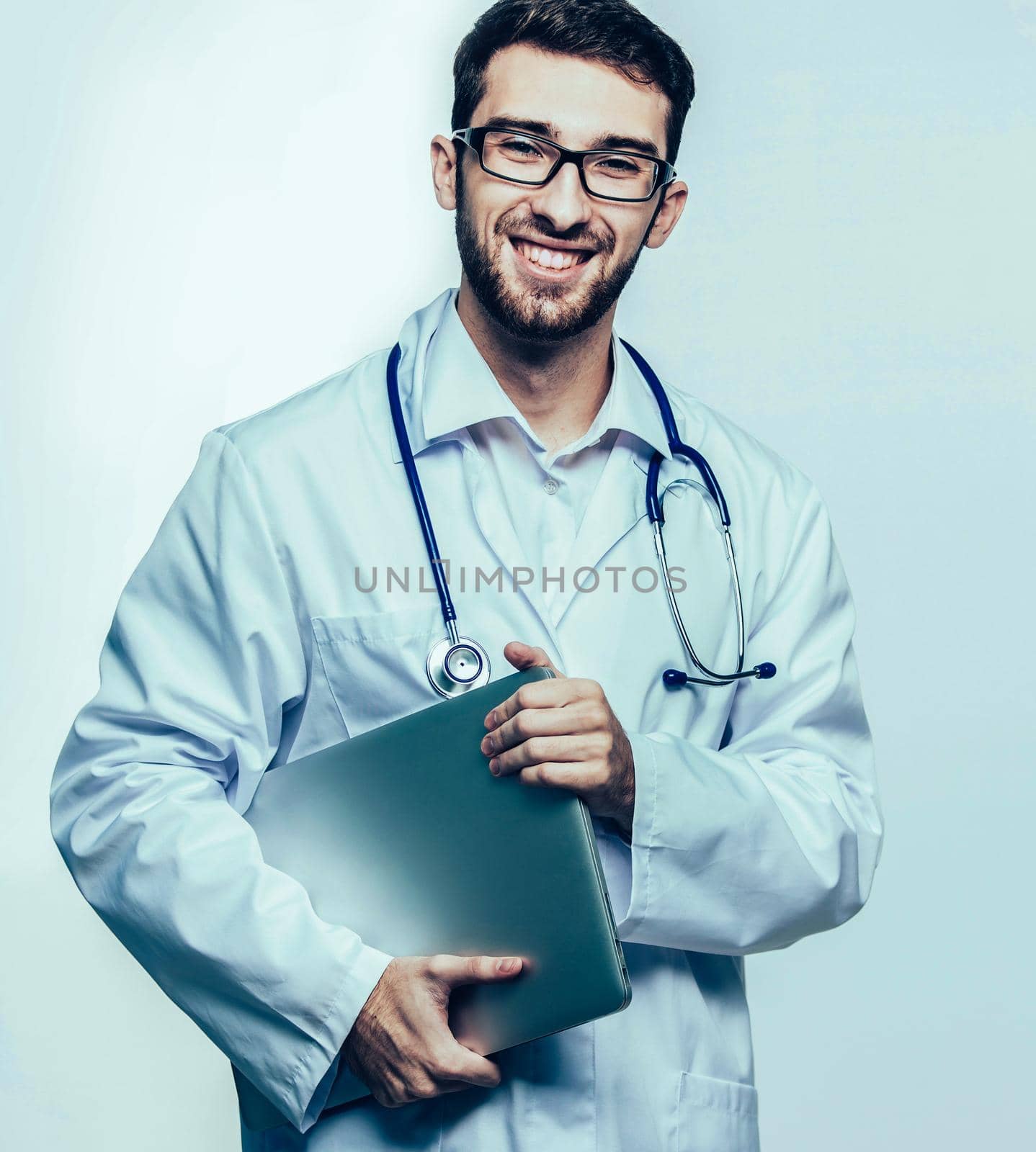 experienced therapist with stethoscope on white background.the photo has a empty space for your text.