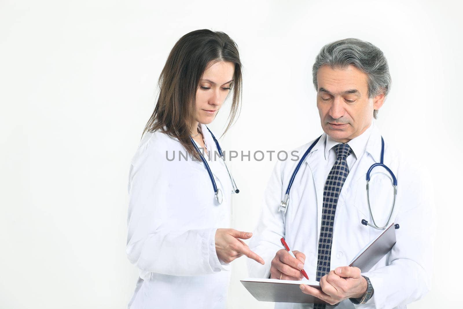 two physician discuss the diagnosis of the patient.isolated on white background.