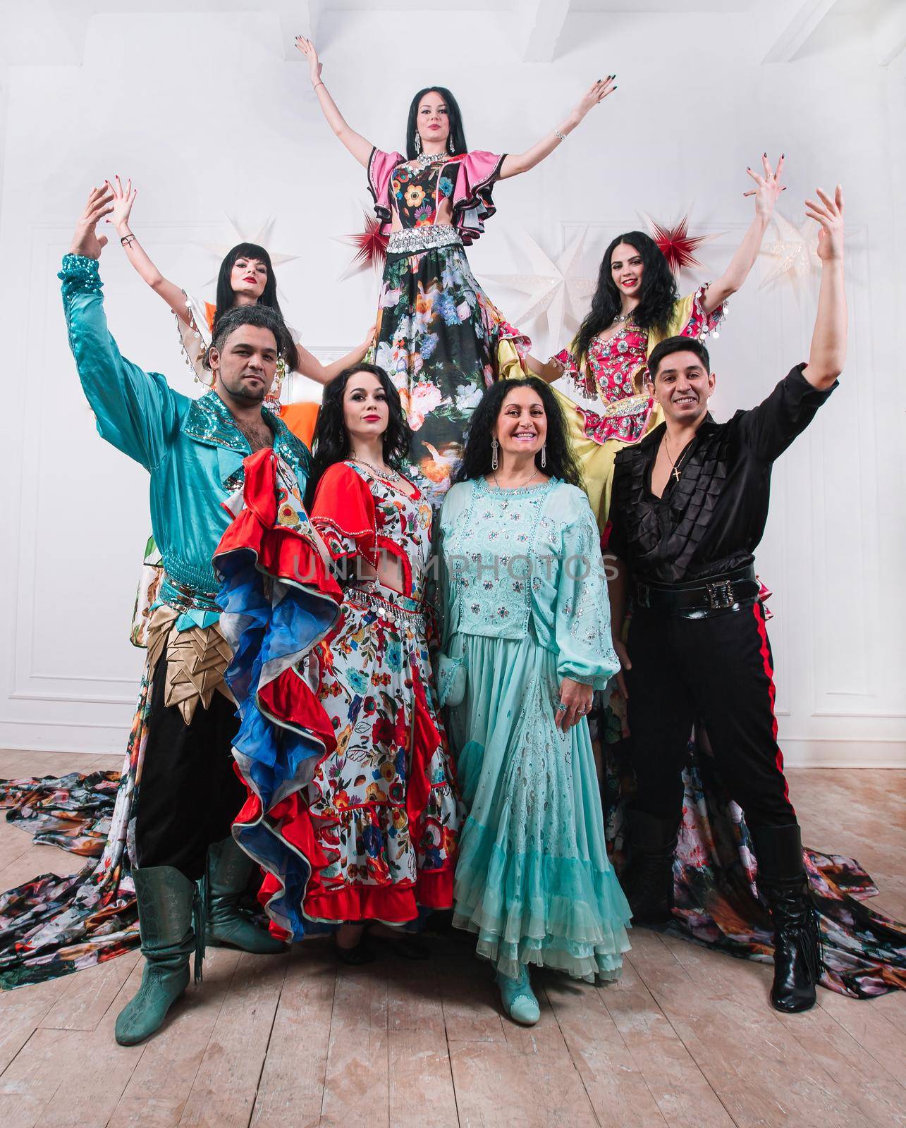 ensemble of Gypsy dance standing on the stage. photo with copy space