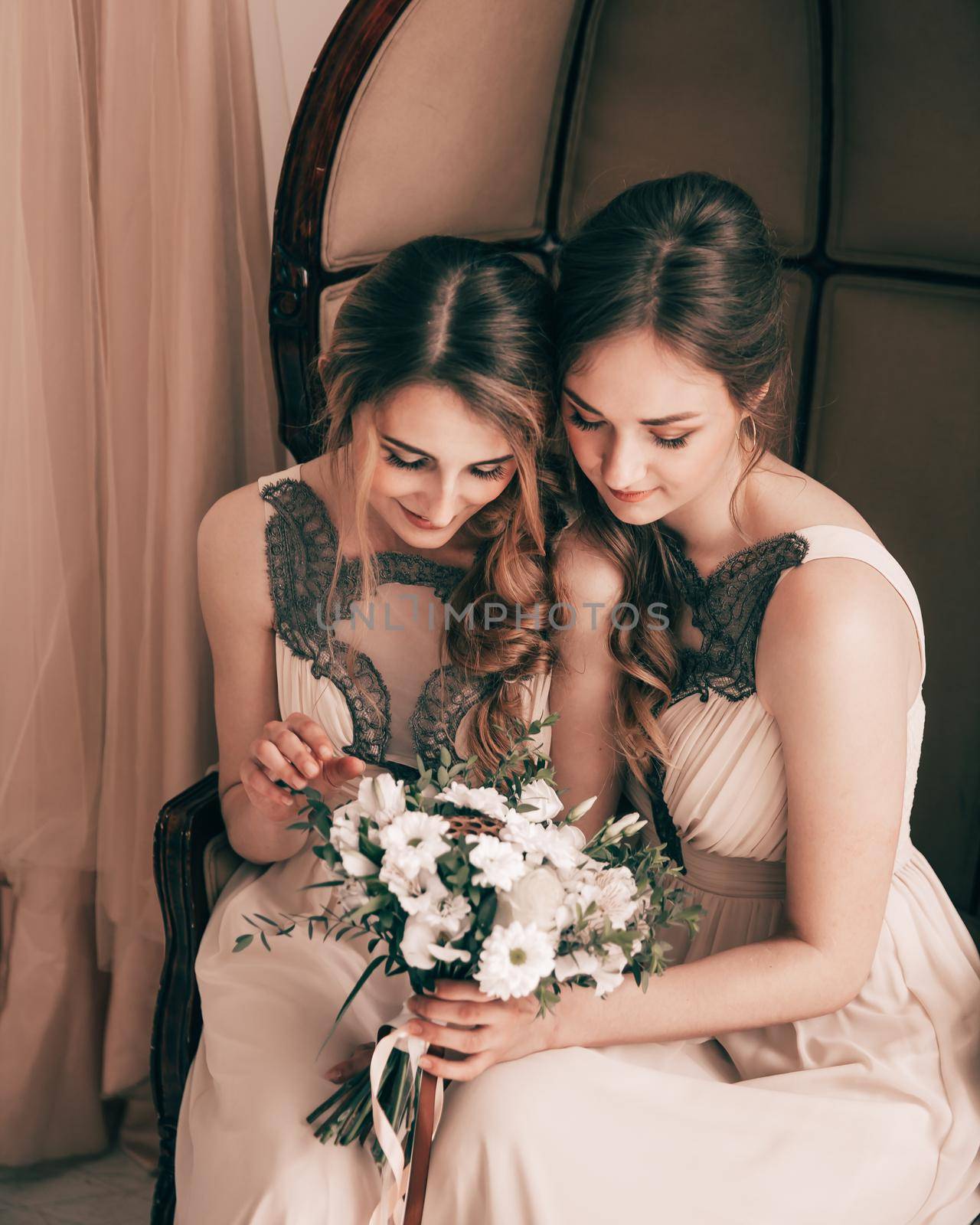 close up. bridesmaids looking at wedding bouquet. holidays and events