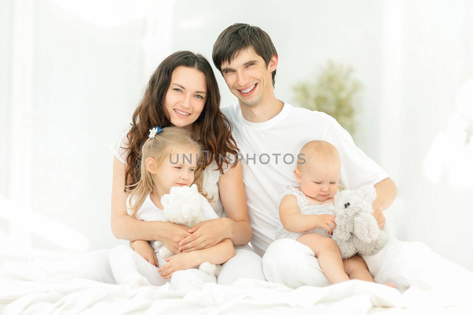 background image of a young happy family.photo with copy space