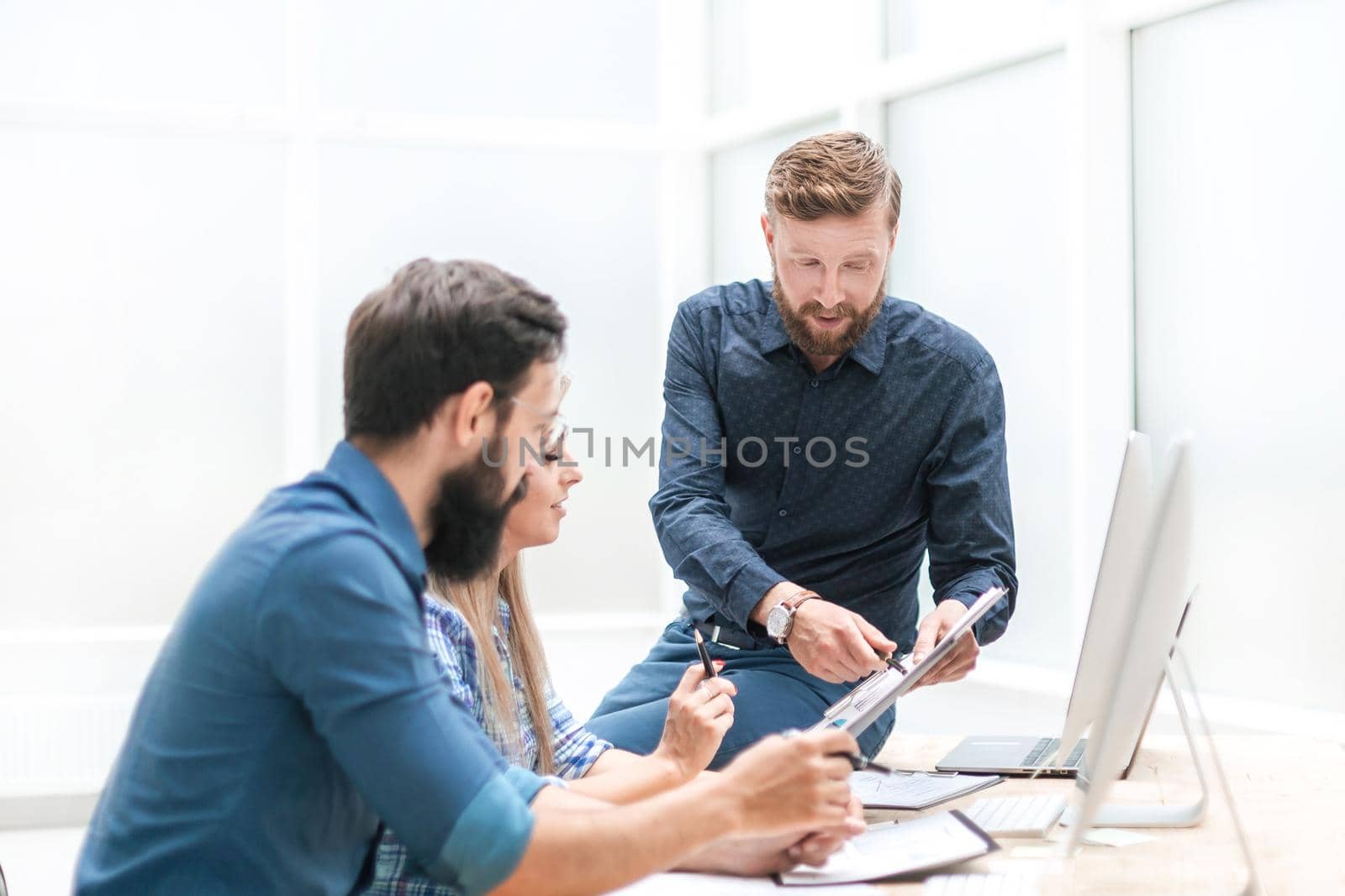 project Manager explaining to the staff the current task . photo with copy space
