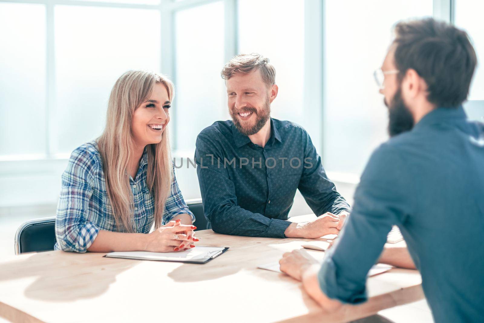 group of business people sitting at the office table. the concept of employment