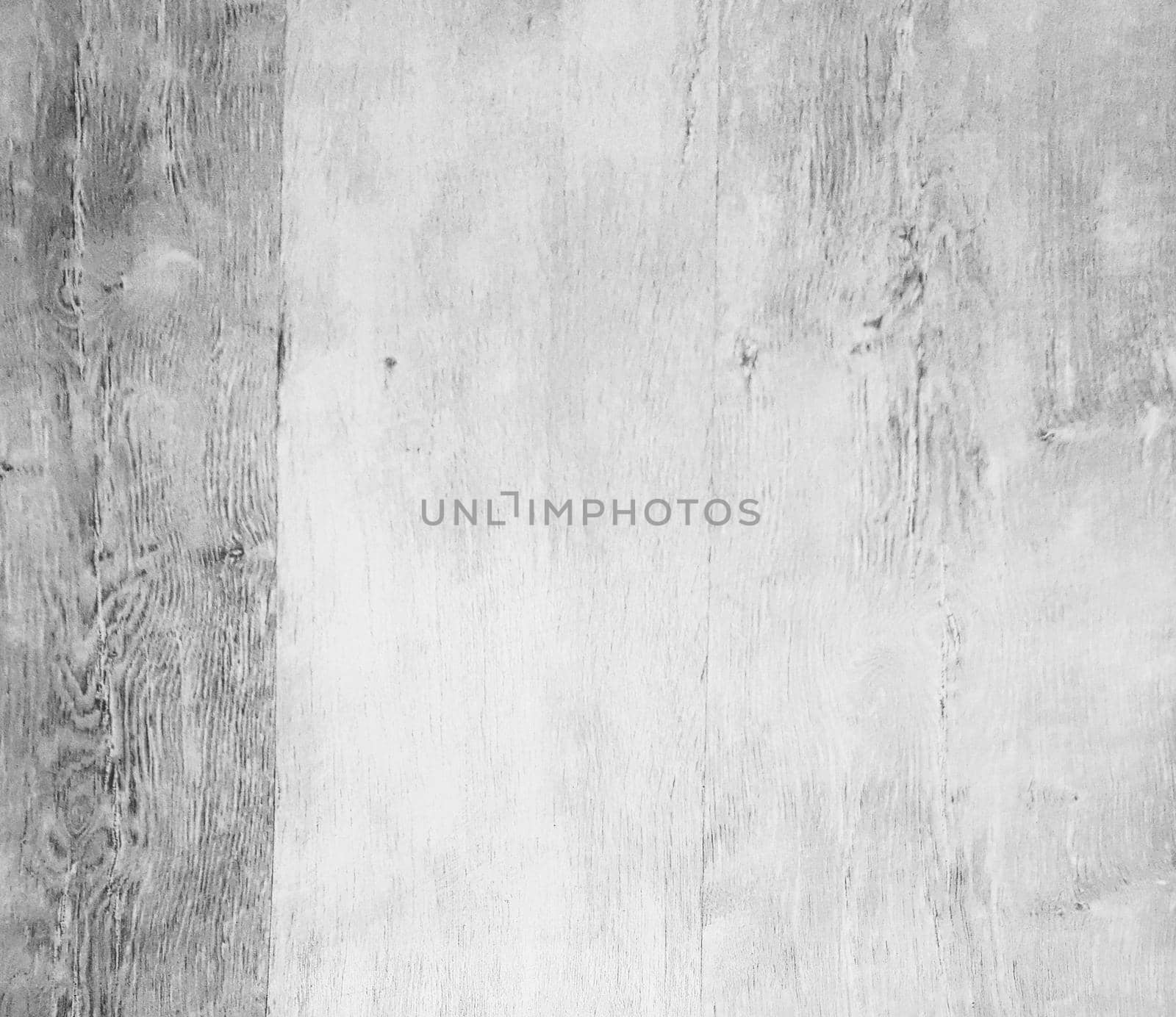 close up. fragment of white non-woven Wallpaper. background and texture
