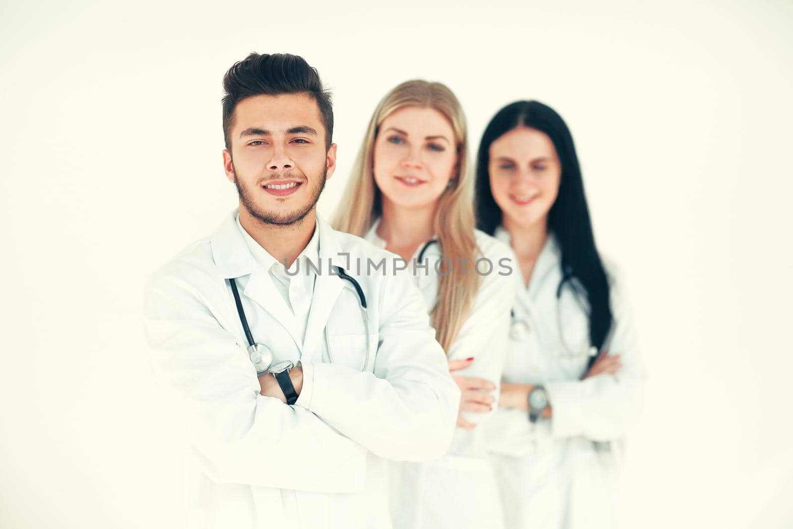 Portrait of group of smiling hospital colleagues standing together