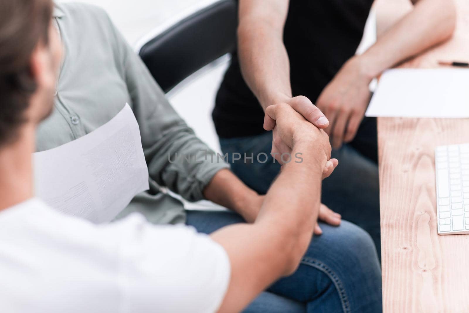 close up. welcome handshake business people in the office. business concept