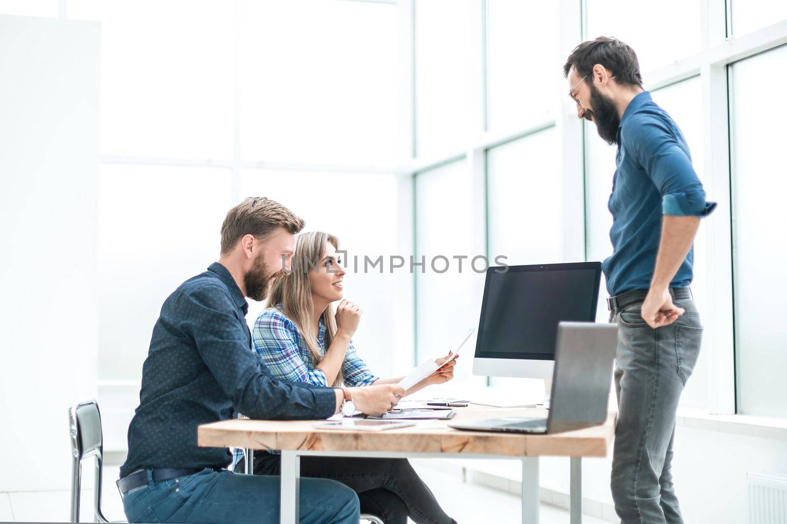 group of business people discussing something near the office Desk . photo with copy space